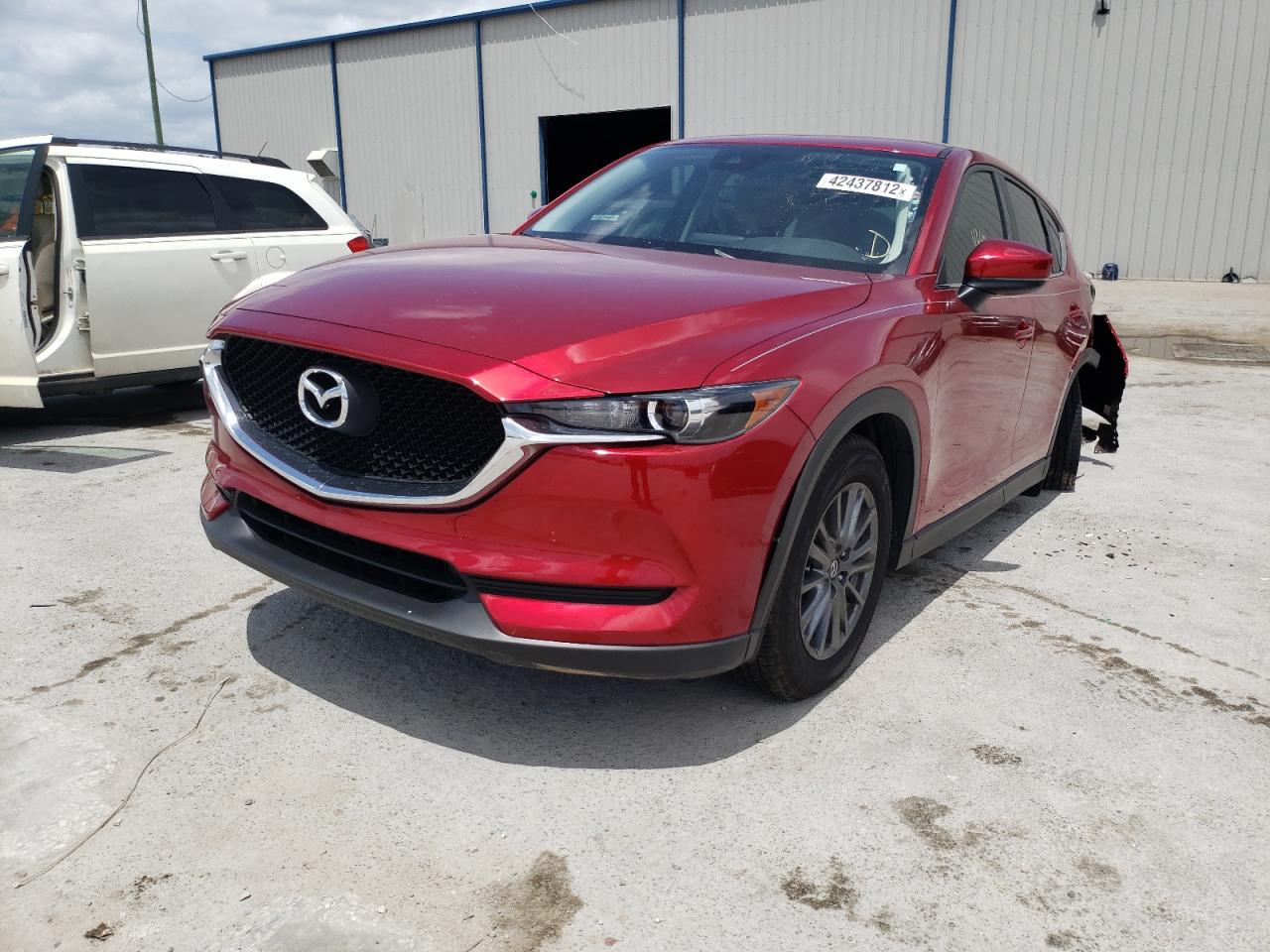 Photo 2 from auction – 2018 MAZDA CX-5 SPORT with VIN JM3KFABM2J1458882