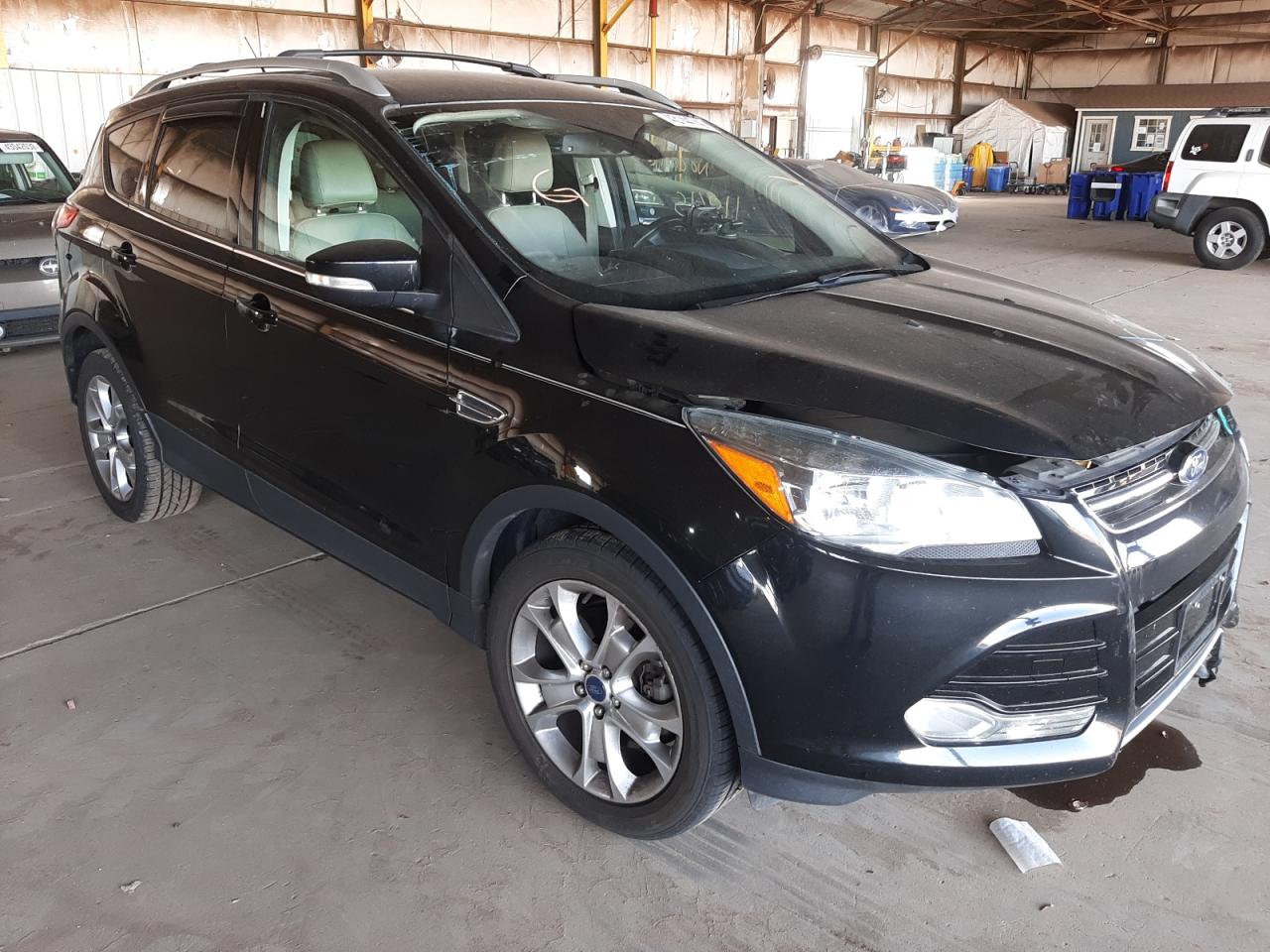 FORD ESCAPE TIT 2014 with VIN 1FMCU0J97EUA11636 - Photo from auction