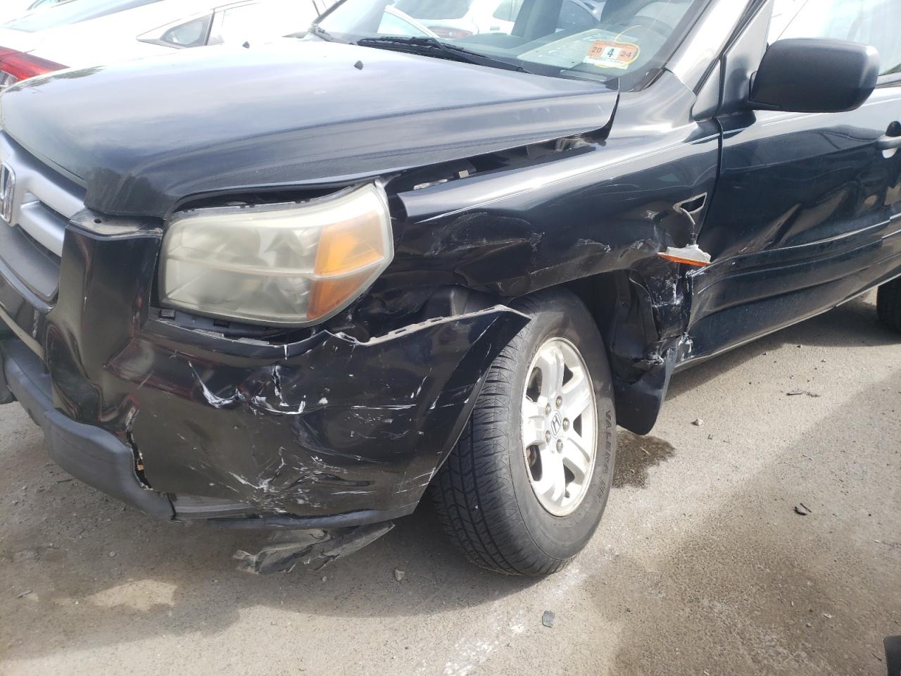 Photo 10 from auction – 2007 HONDA PILOT LX with VIN 5FNYF18157B014895