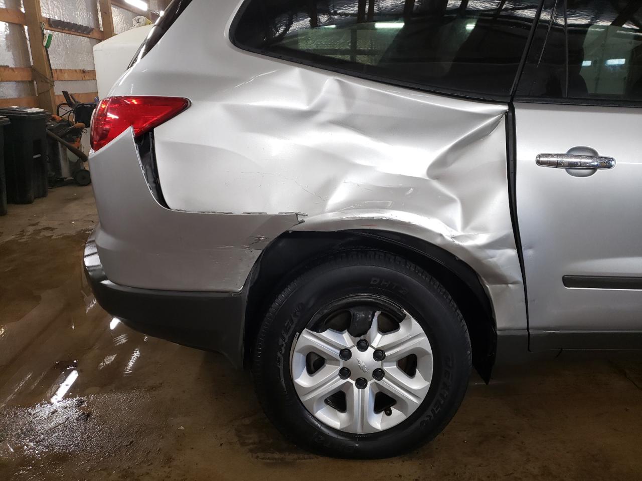 Photo 9 from auction – 2010 CHEVROLET TRAVERSE L with VIN 1GNLREED0AS140543