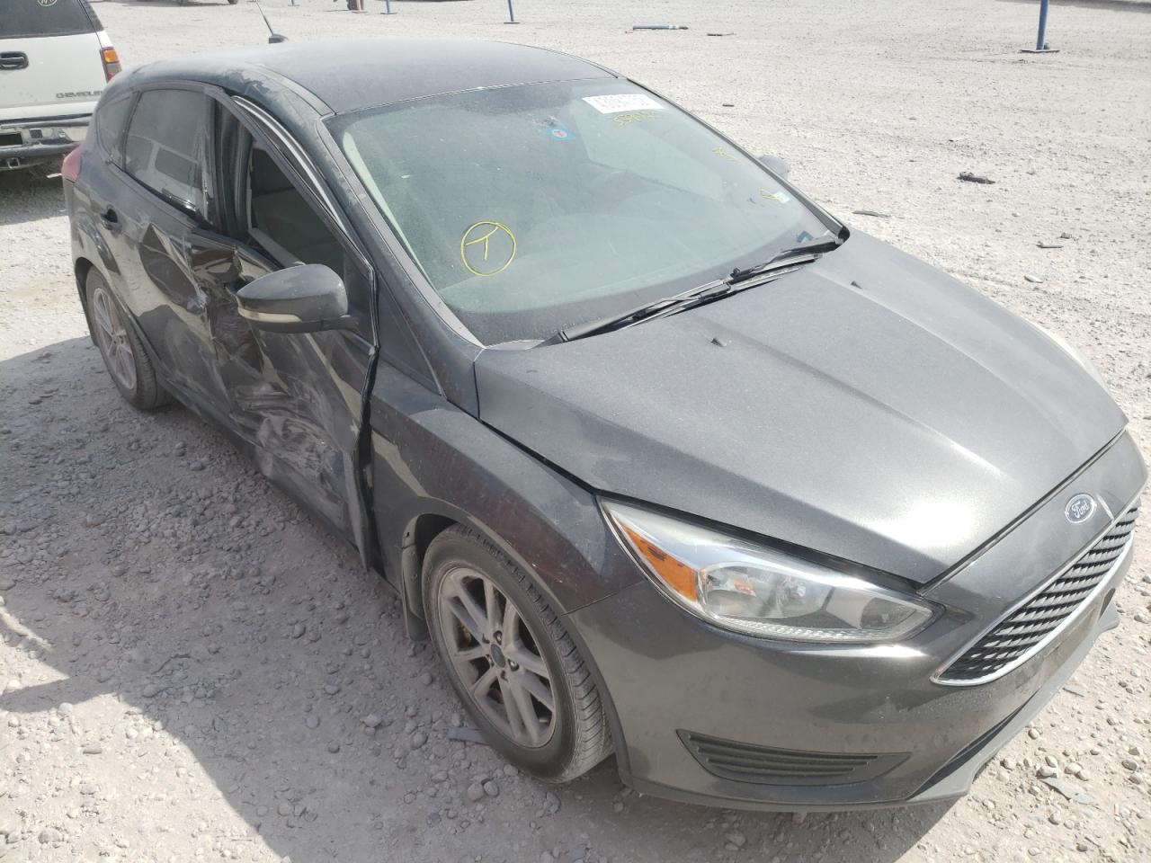 FORD FOCUS SE 2016 with VIN 1FADP3K2XGL359920 - Photo from auction