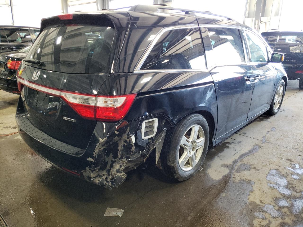 Photo 4 from auction – 2011 HONDA ODYSSEY TO with VIN 5FNRL5H91BB081657