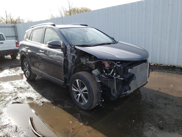 TOYOTA RAV4 XLE 2017 with VIN JTMRFREV1HD213137 - Photo from auction