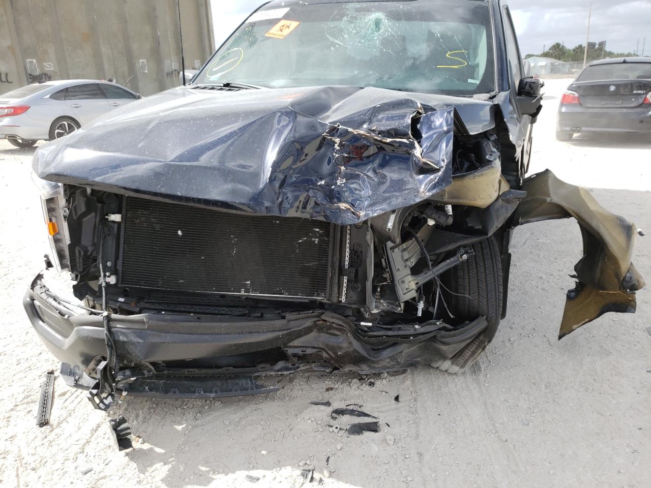 Photo 9 from auction – 2021 FORD F150 with VIN 1FTMF1C52MKE33973
