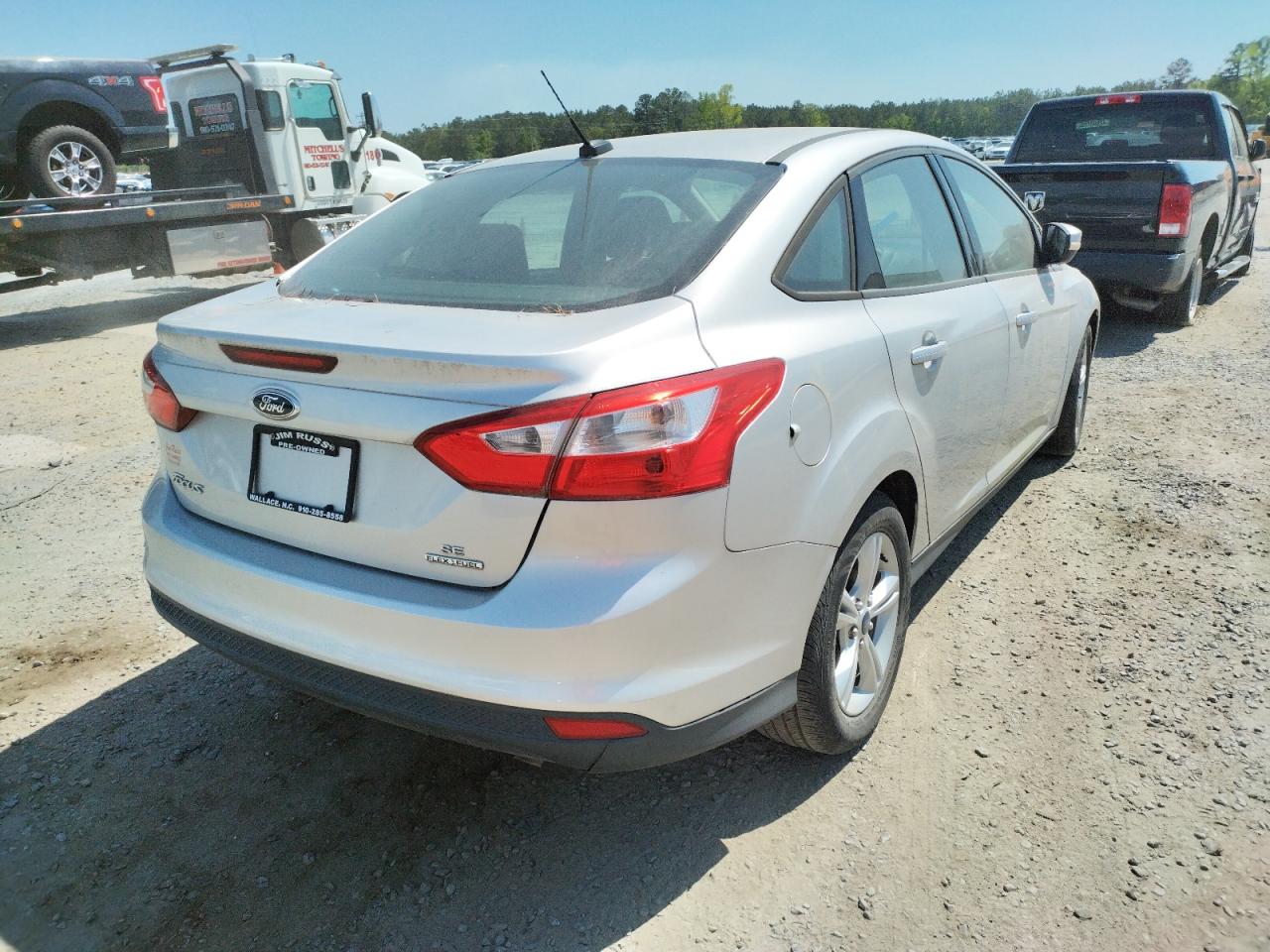 Photo 4 from auction – 2014 FORD FOCUS SE with VIN 1FADP3F23EL393527