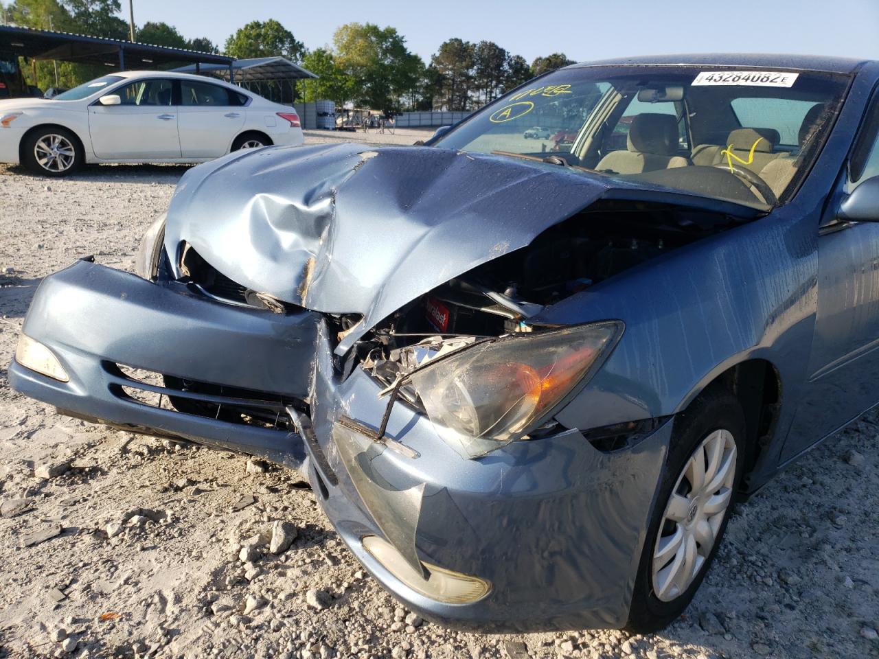 Photo 9 from auction – 2004 TOYOTA CAMRY LE with VIN 4T1BE32K84U895175