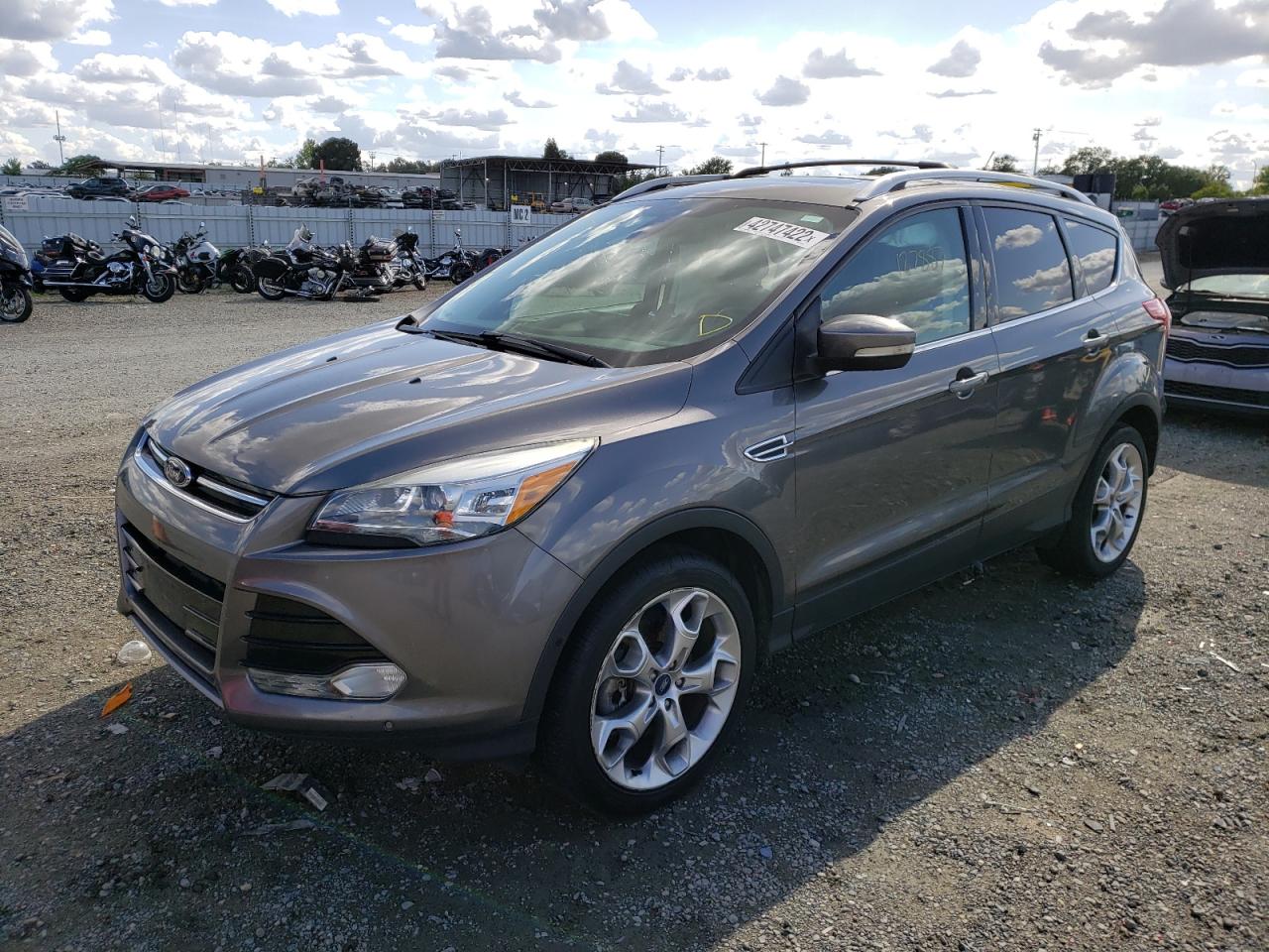Photo 2 from auction – 2013 FORD ESCAPE TIT with VIN 1FMCU9J96DUC86708