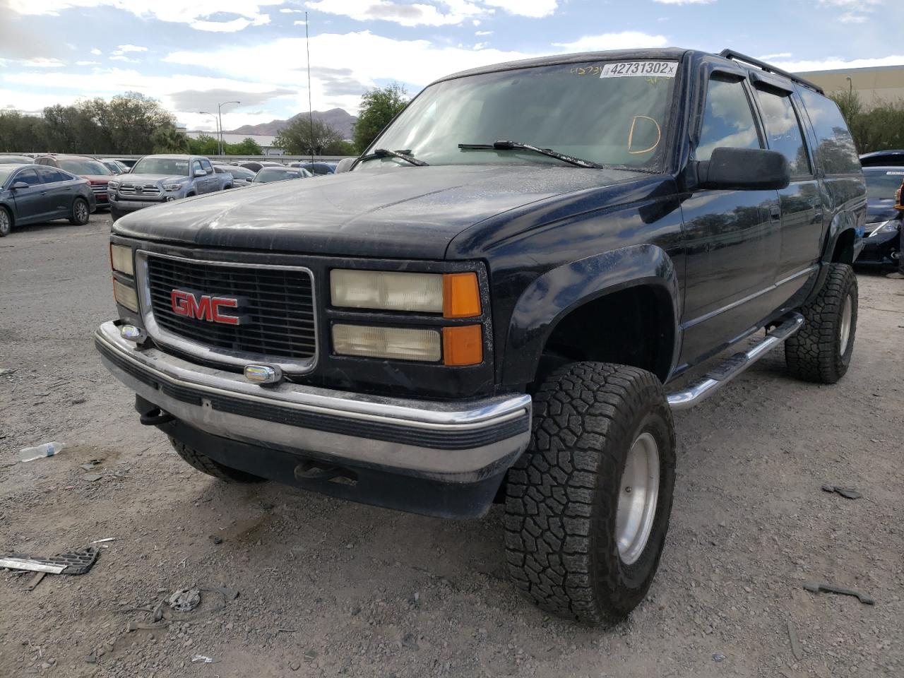Photo 2 from auction – 1997 GMC SUBURBAN with VIN 3GKFK16RXVG501467