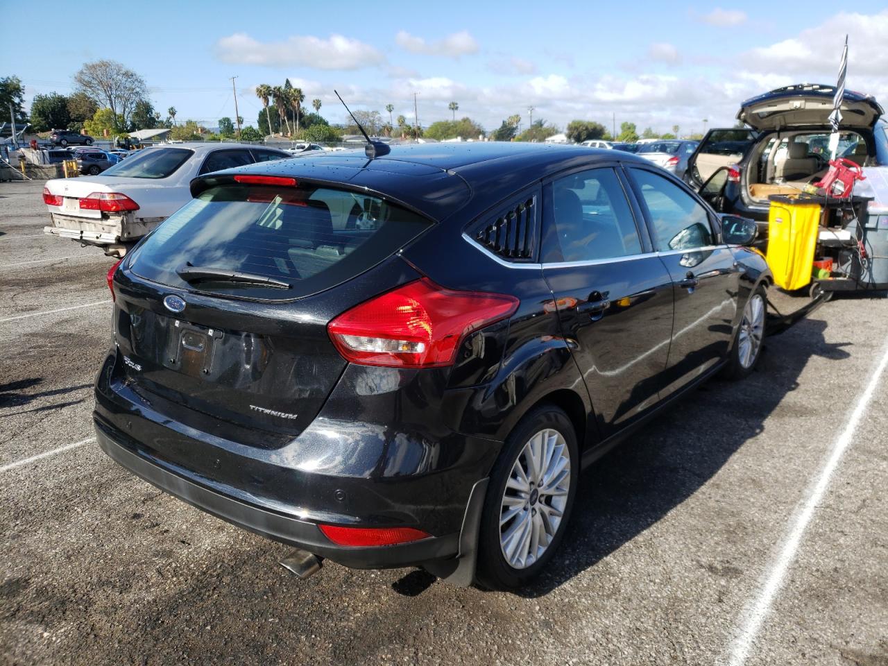 Photo 4 from auction – 2015 FORD FOCUS TITA with VIN 1FADP3N24FL357929