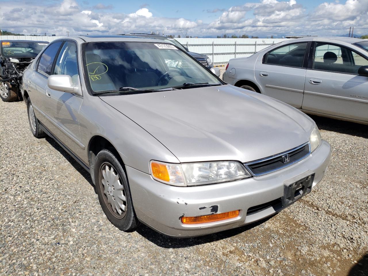 HONDA ACCORD EX 1997 with VIN 1HGCD566XVA027459 - Photo from auction