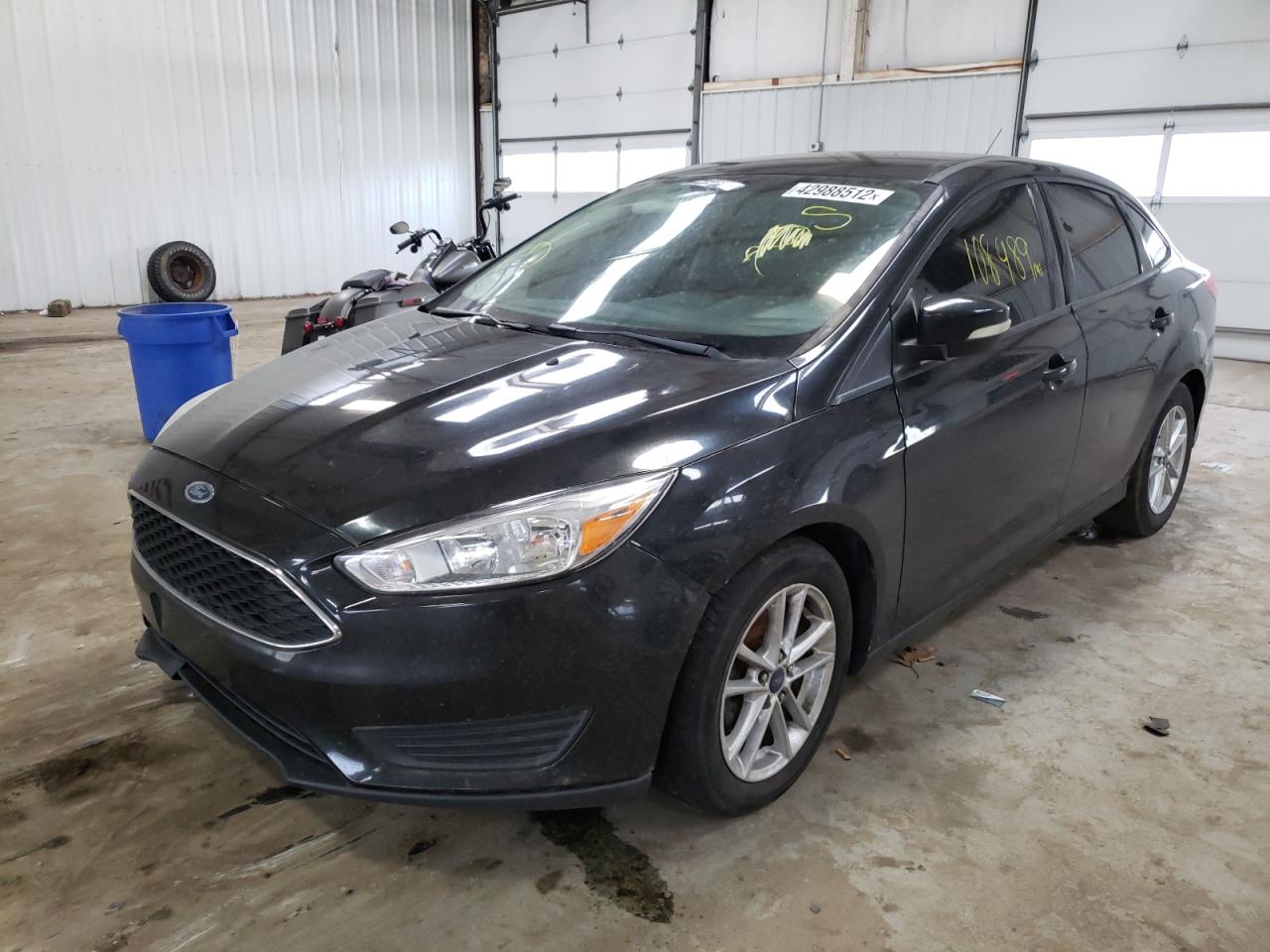 Photo 2 from auction – 2015 FORD FOCUS with VIN 1FADP3F24FL335122