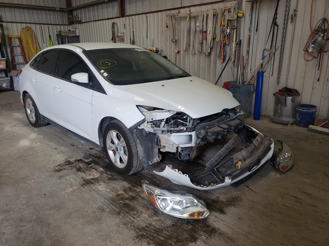 FORD FOCUS SE 2014 with VIN 1FADP3F26EL423362 - Photo from auction