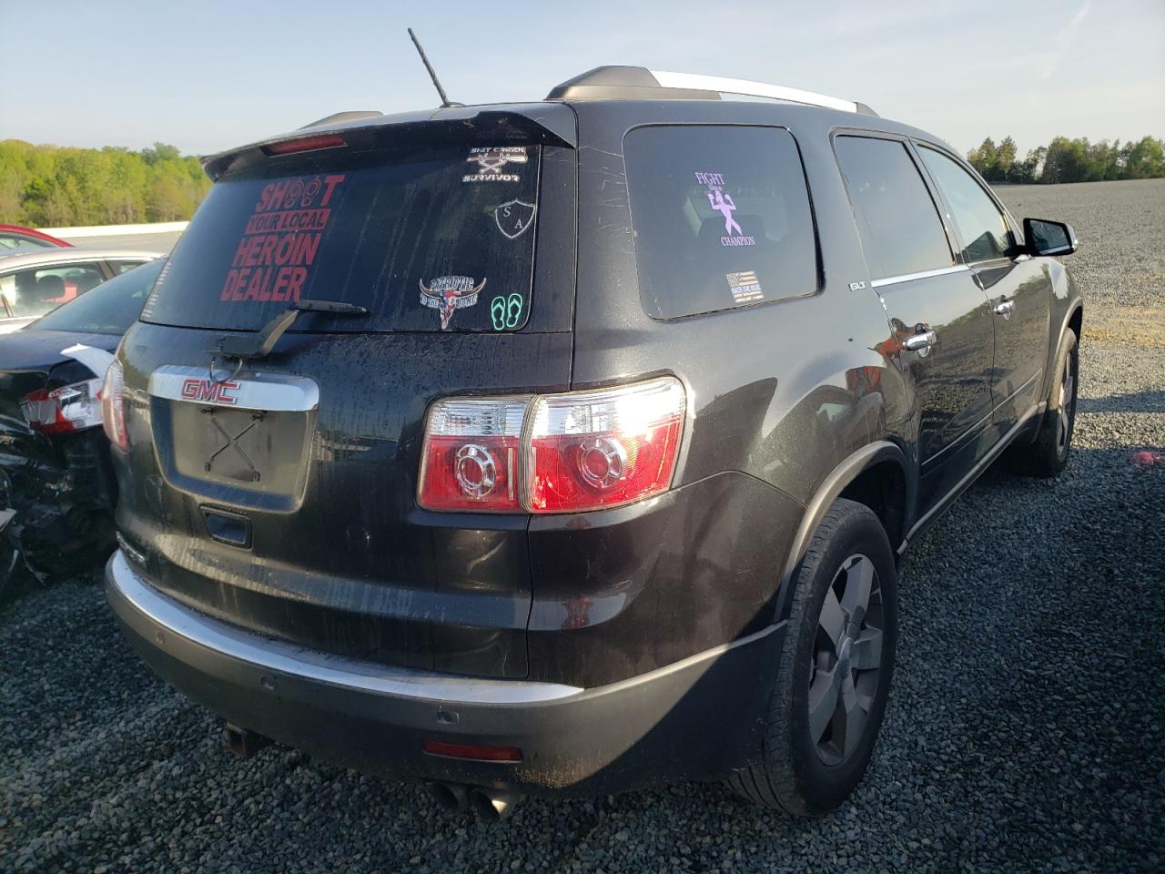 Photo 4 from auction – 2010 GMC ACADIA SLT with VIN 1GKLRMED7AJ182415