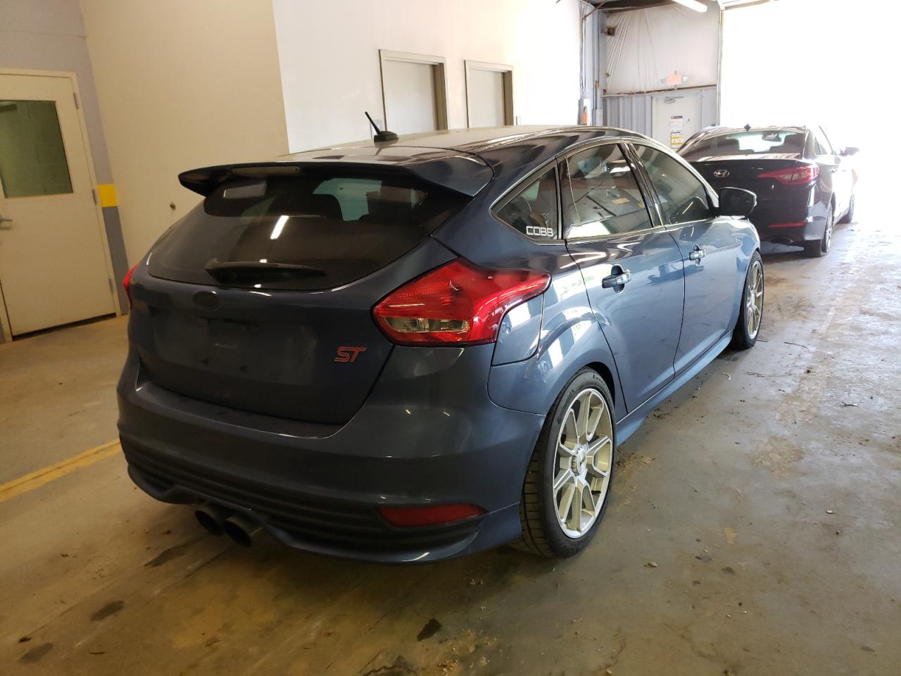 Photo 4 from auction – 2018 FORD FOCUS ST with VIN 1FADP3L91JL245498