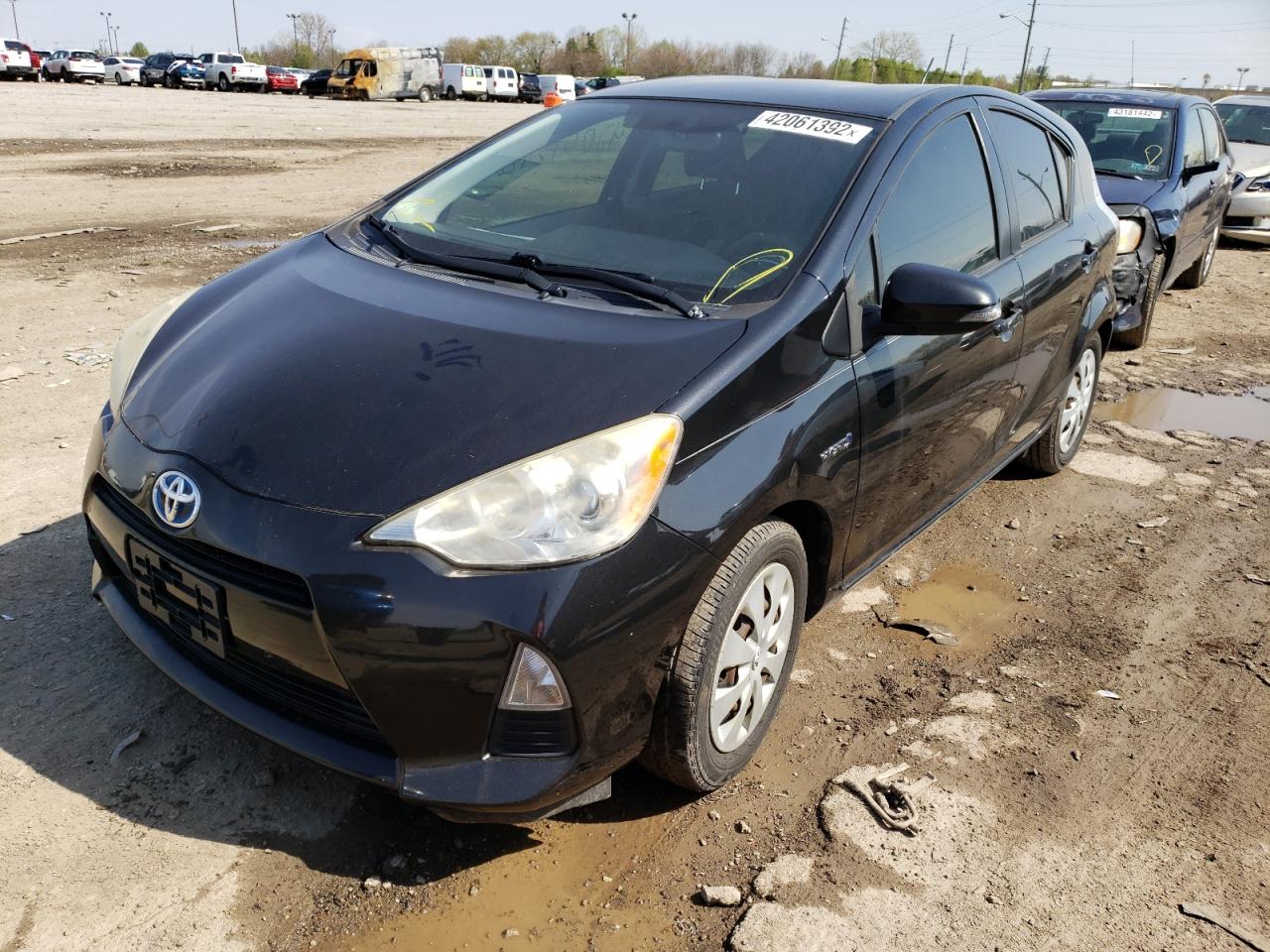 Photo 2 from auction – 2012 TOYOTA PRIUS C with VIN JTDKDTB31C1014154