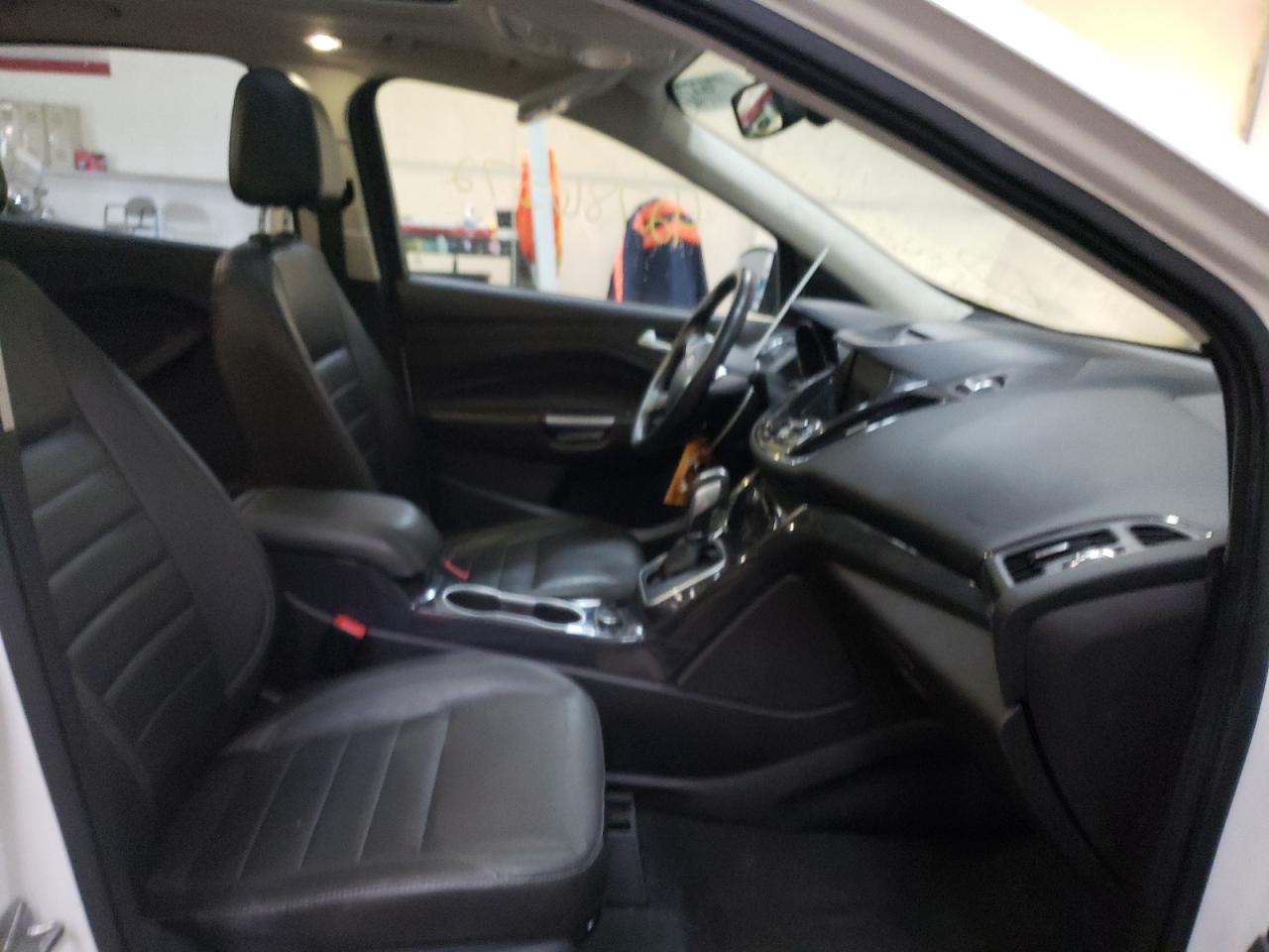 Photo 5 from auction – 2014 FORD ESCAPE TIT with VIN 1FMCU9J98EUB13080
