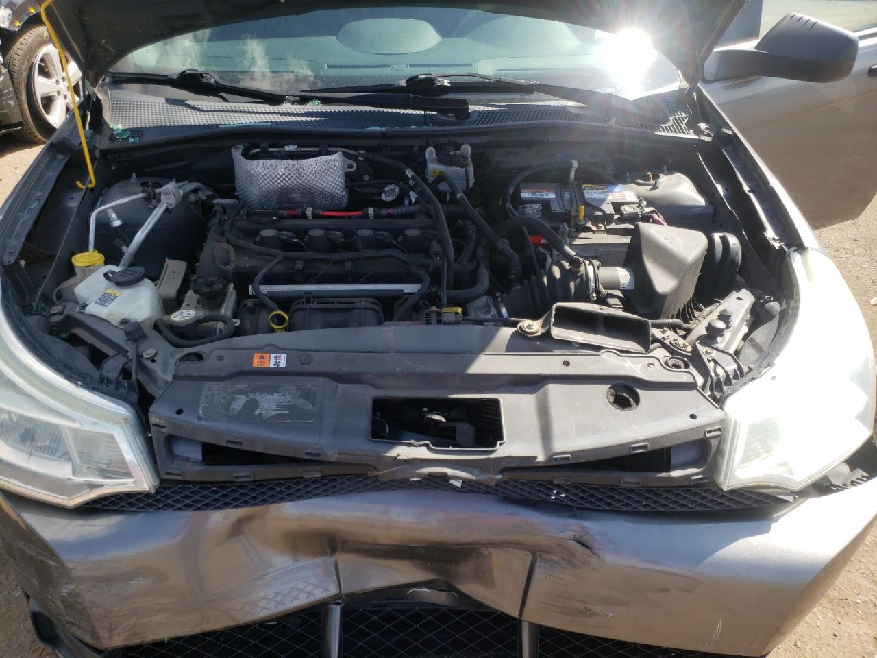 Photo 7 from auction – 2010 FORD FOCUS SE with VIN 1FAHP3FNXAW112070