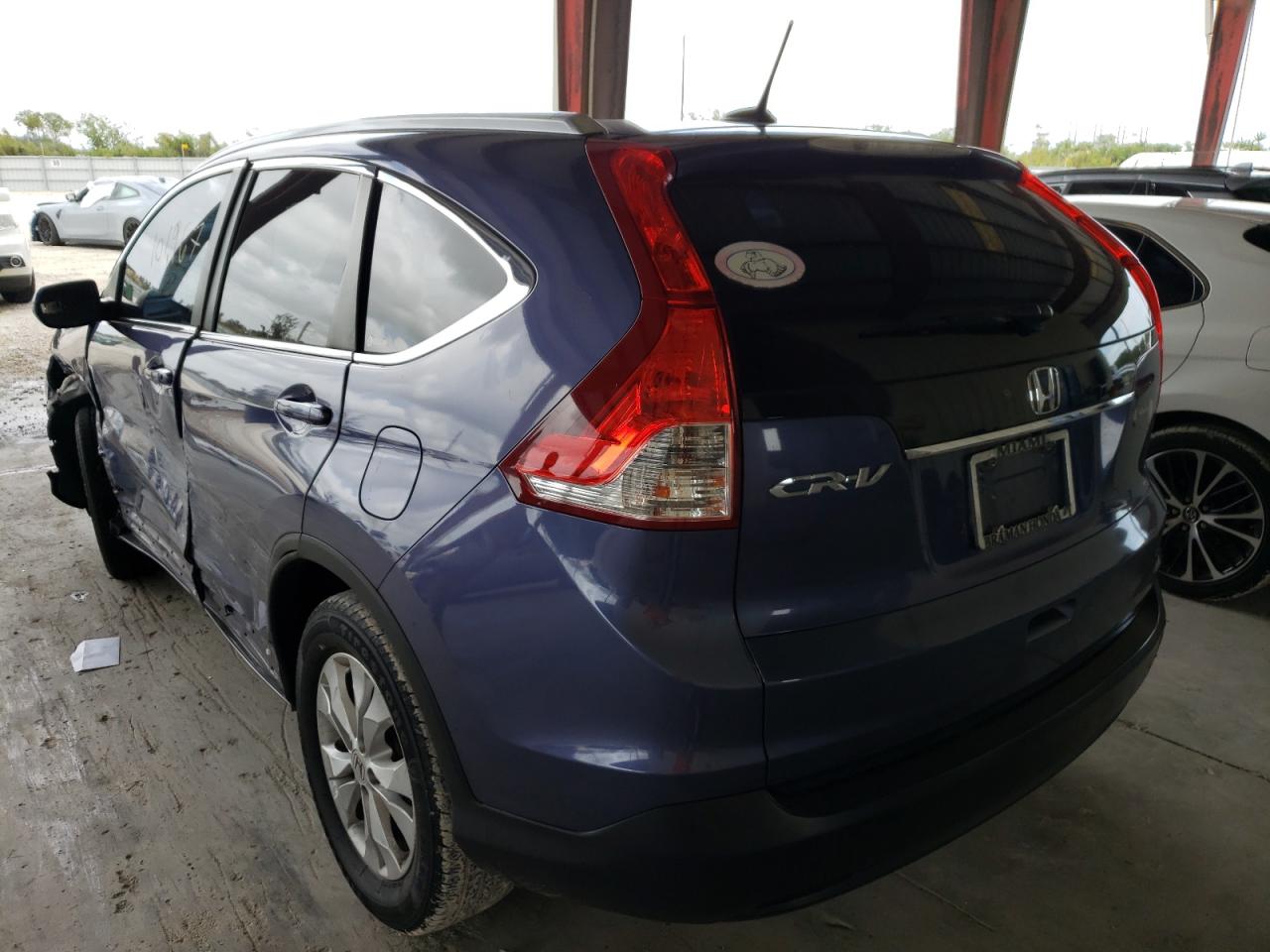 Photo 3 from auction – 2012 HONDA CR-V EXL with VIN 5J6RM3H74CL004614