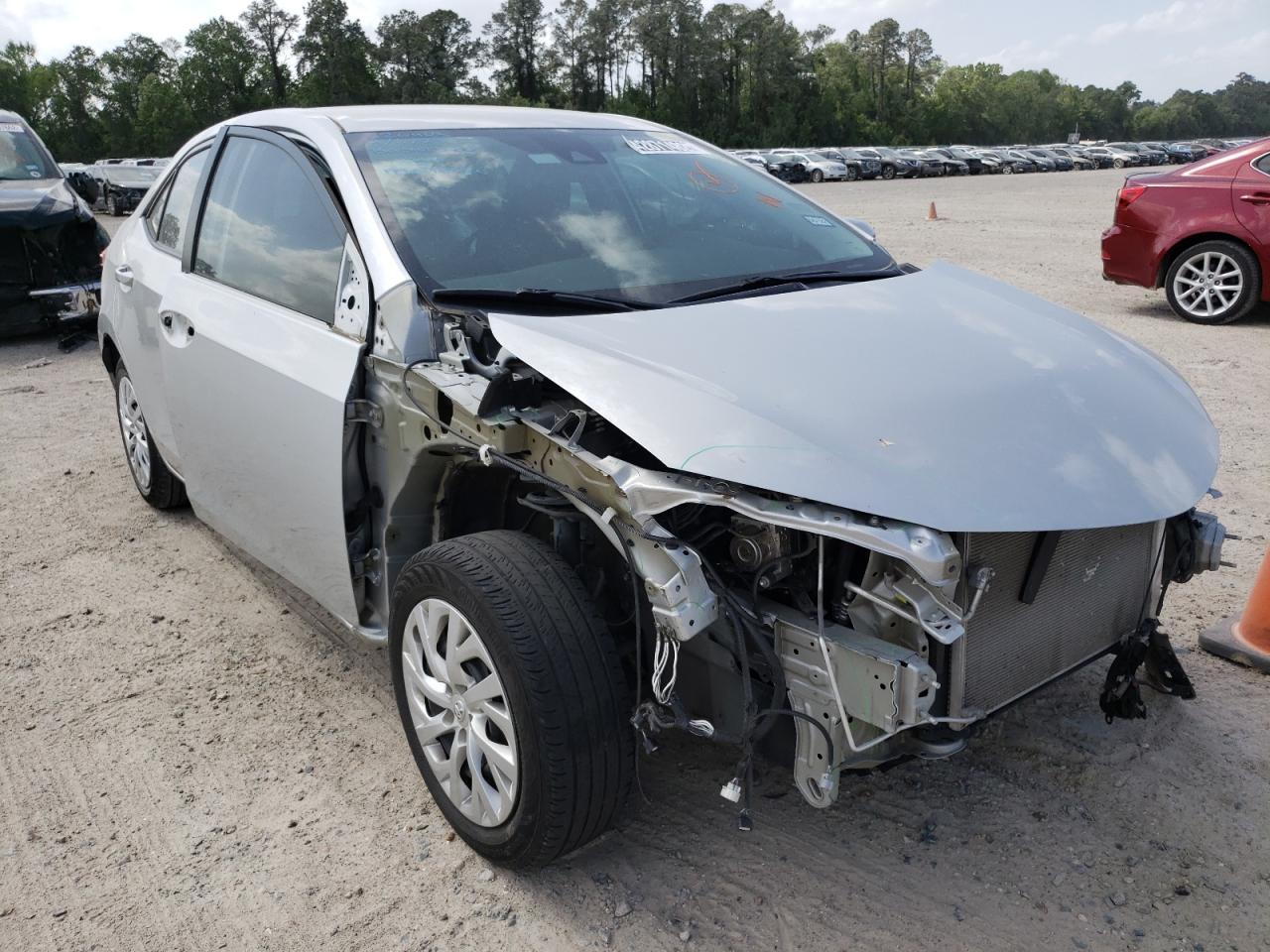 TOYOTA COROLLA L 2019 with VIN 5YFBURHE4KP867072 - Photo from auction