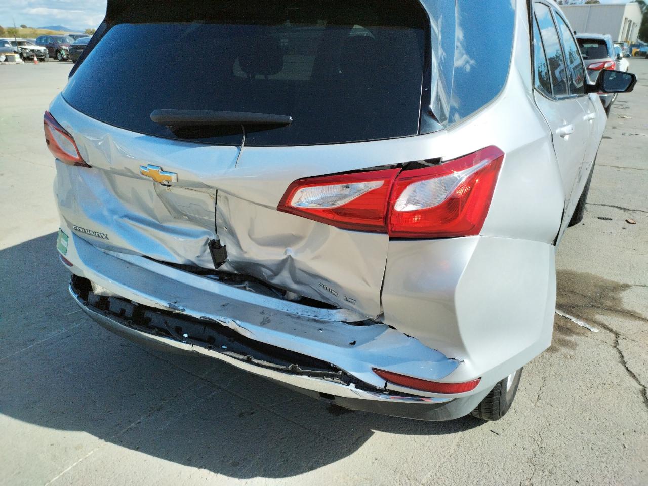 Photo 9 from auction – 2018 CHEVROLET EQUINOX LT with VIN 3GNAXSEV5JS574501