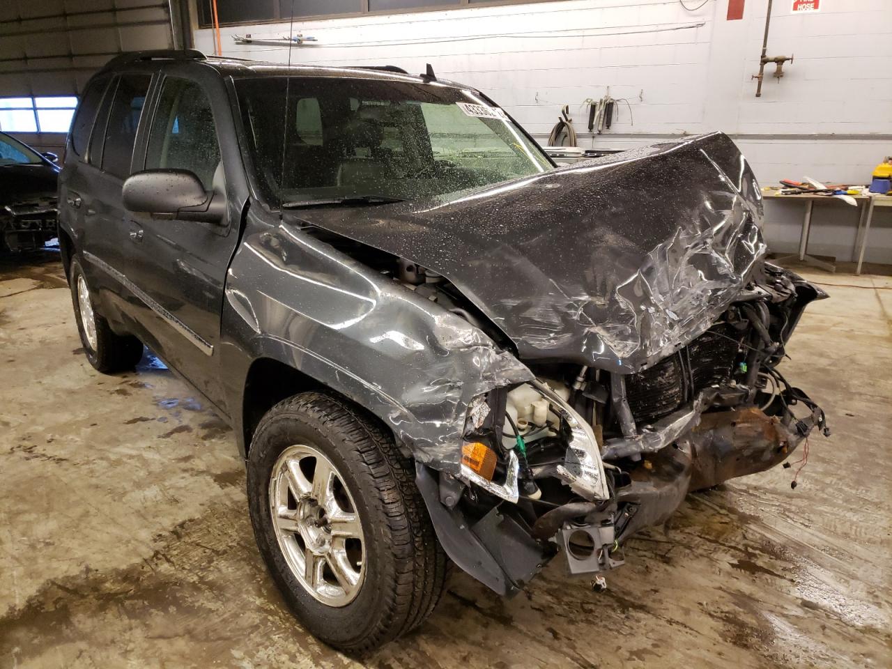 GMC ENVOY 2007 with VIN 1GKDT13S672106094 - Photo from auction