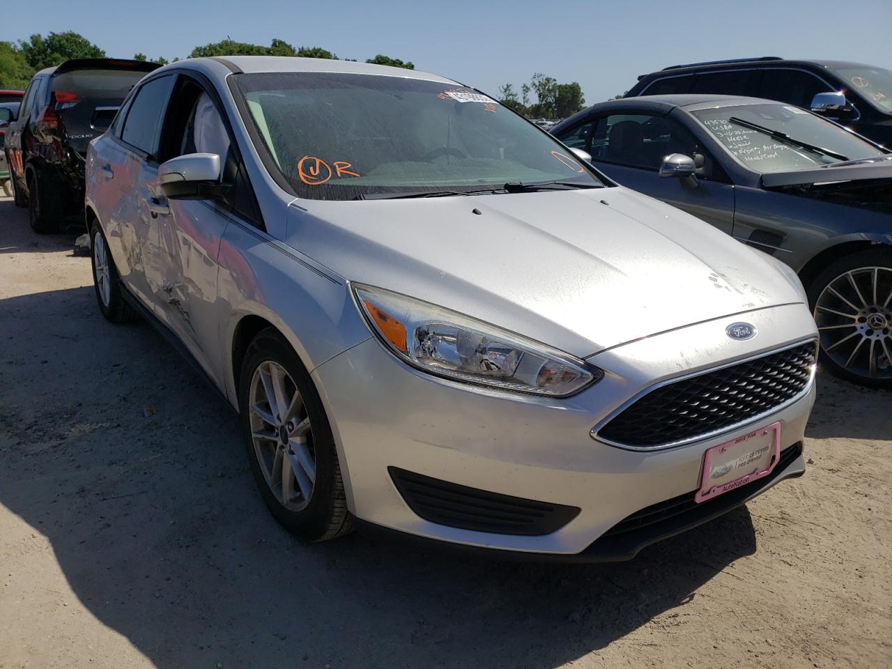 FORD FOCUS SE 2017 with VIN 1FADP3F26HL216300 - Photo from auction