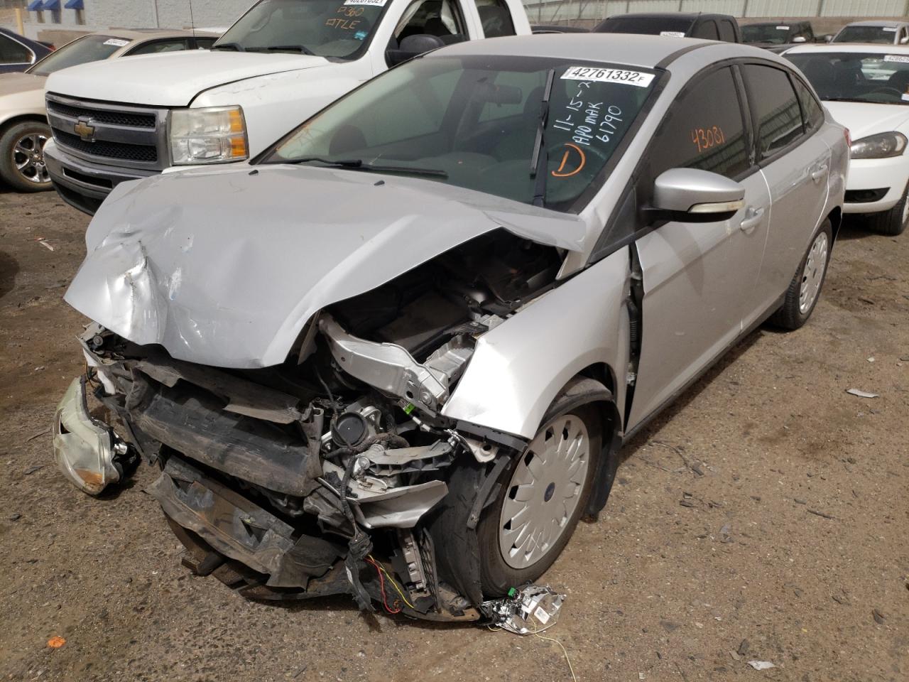 Photo 2 from auction – 2014 FORD FOCUS SE with VIN 1FADP3F28EL351368