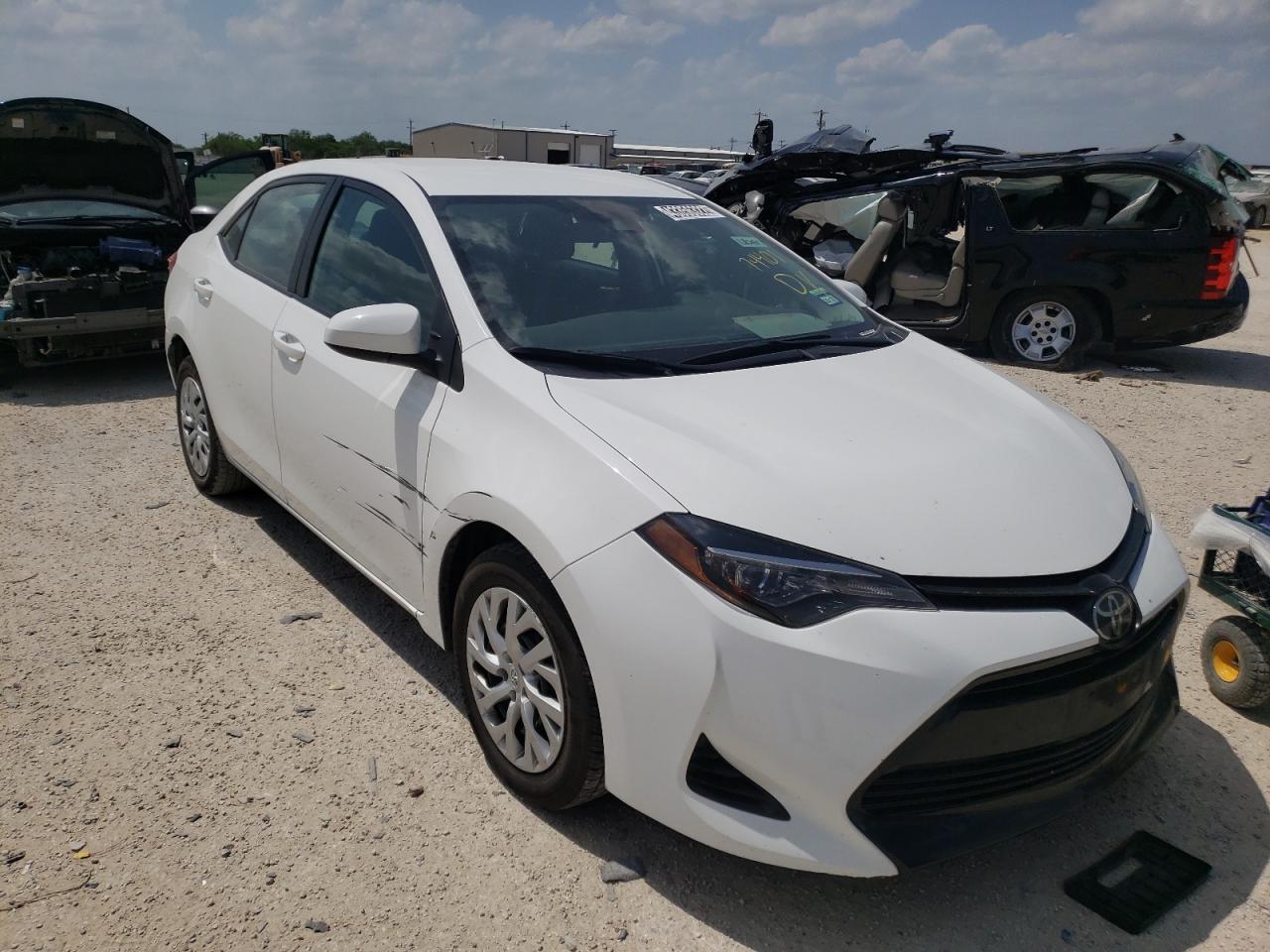 TOYOTA COROLLA L 2019 with VIN 5YFBURHE0KP898903 - Photo from auction