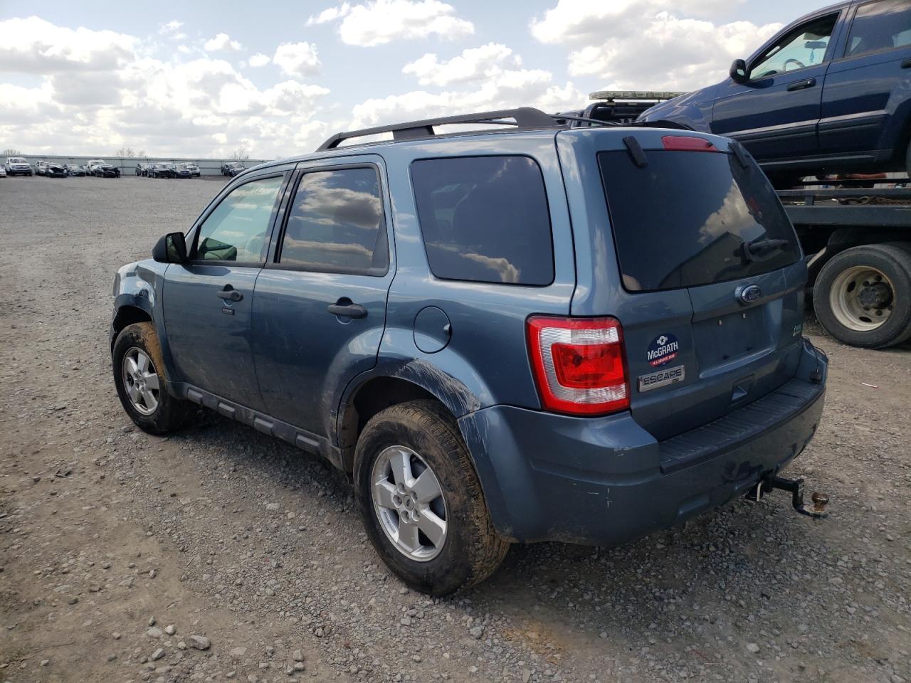Photo 3 from auction – 2011 FORD ESCAPE with VIN 1FMCU9DGXBKA31546