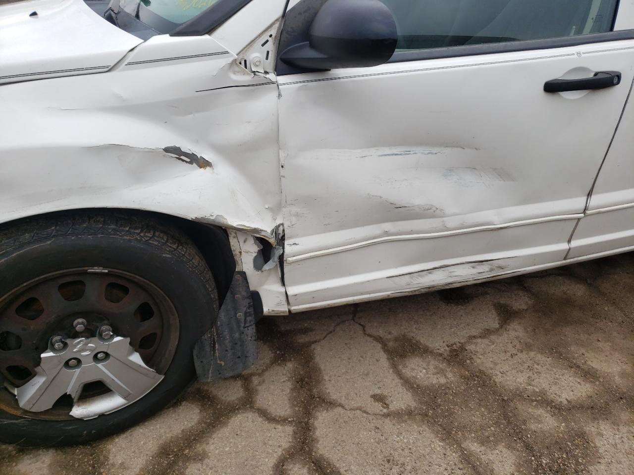 Photo 9 from auction – 2007 DODGE CALIBER SX with VIN 1B3HB48B57D552026