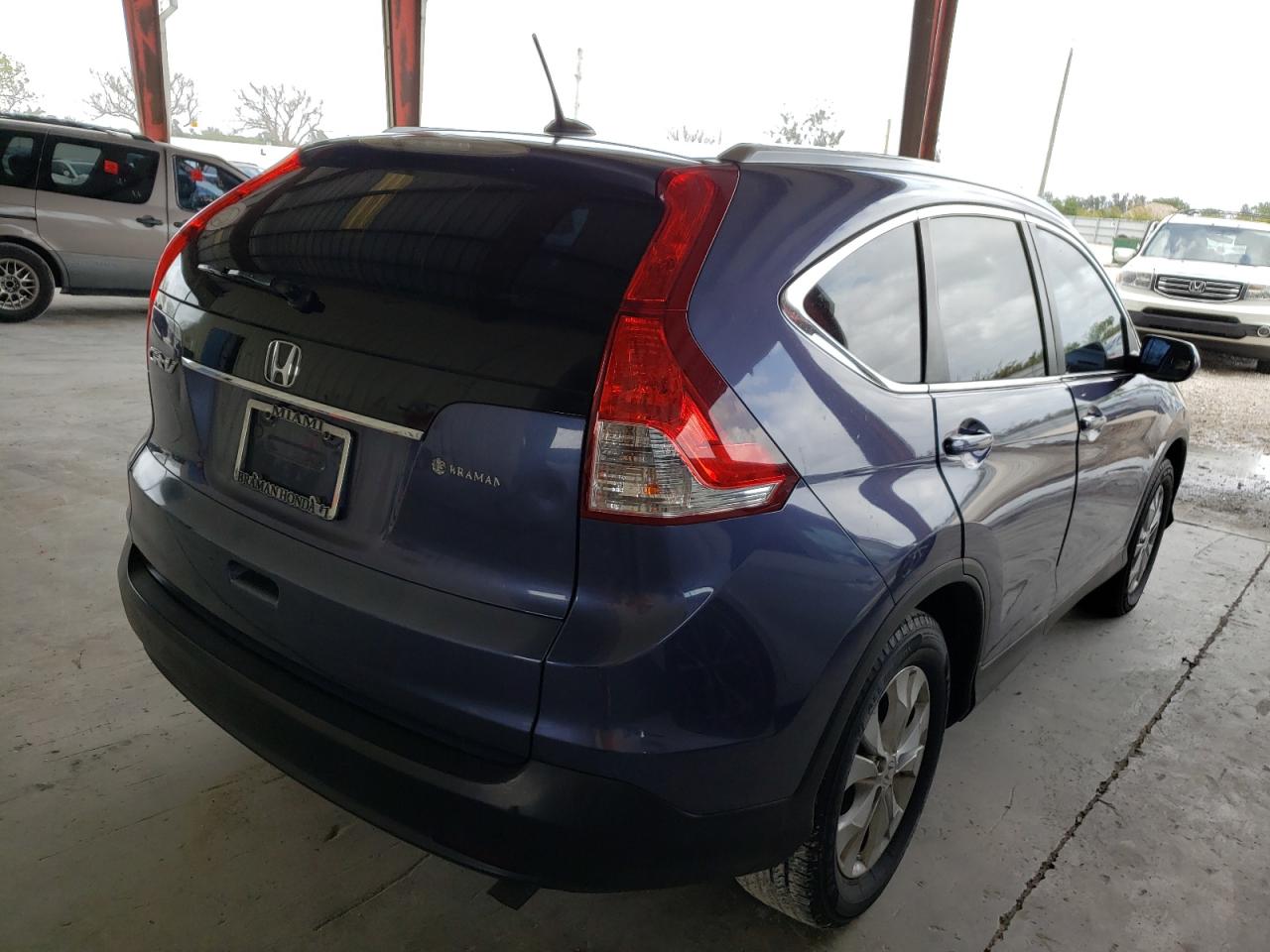Photo 4 from auction – 2012 HONDA CR-V EXL with VIN 5J6RM3H74CL004614