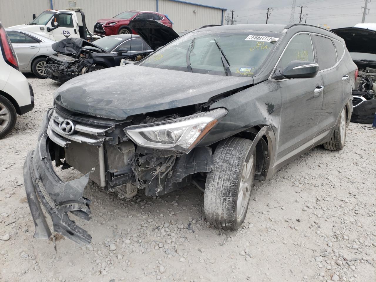 Photo 2 from auction – 2013 HYUNDAI SANTA FE S with VIN 5XYZU3LA3DG123728