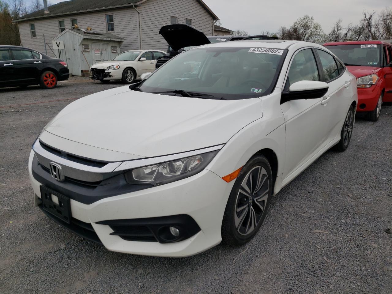 Photo 2 from auction – 2016 HONDA CIVIC EX with VIN 19XFC1F33GE217438