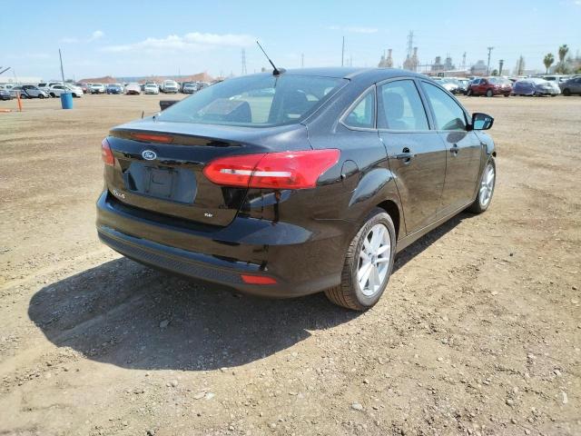 Photo 4 from auction – 2017 FORD FOCUS SE with VIN 1FADP3F26HL266582