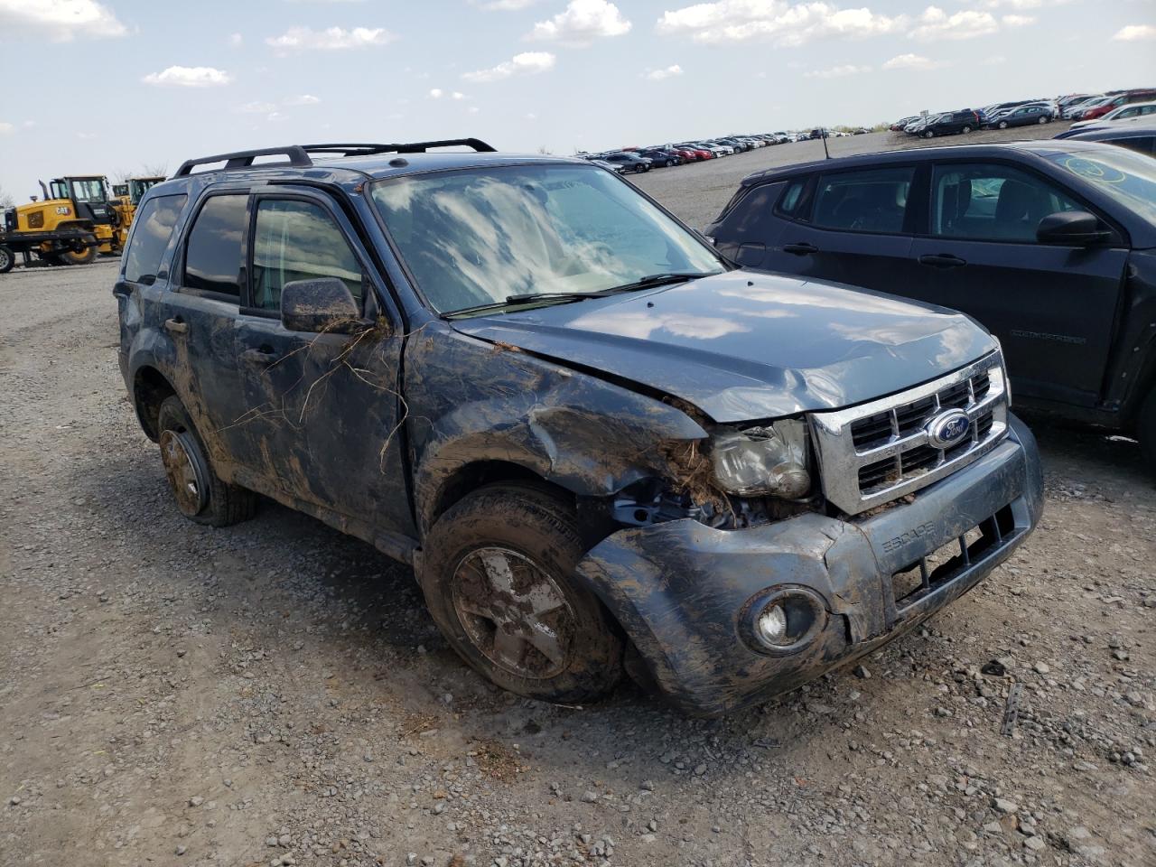 FORD ESCAPE 2011 with VIN 1FMCU9DGXBKA31546 - Photo from auction