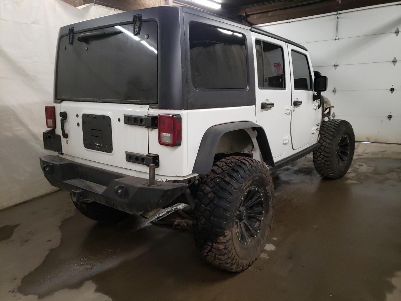 Photo 4 from auction – 2013 JEEP WRANGLER U with VIN 1C4BJWDG5DL627555
