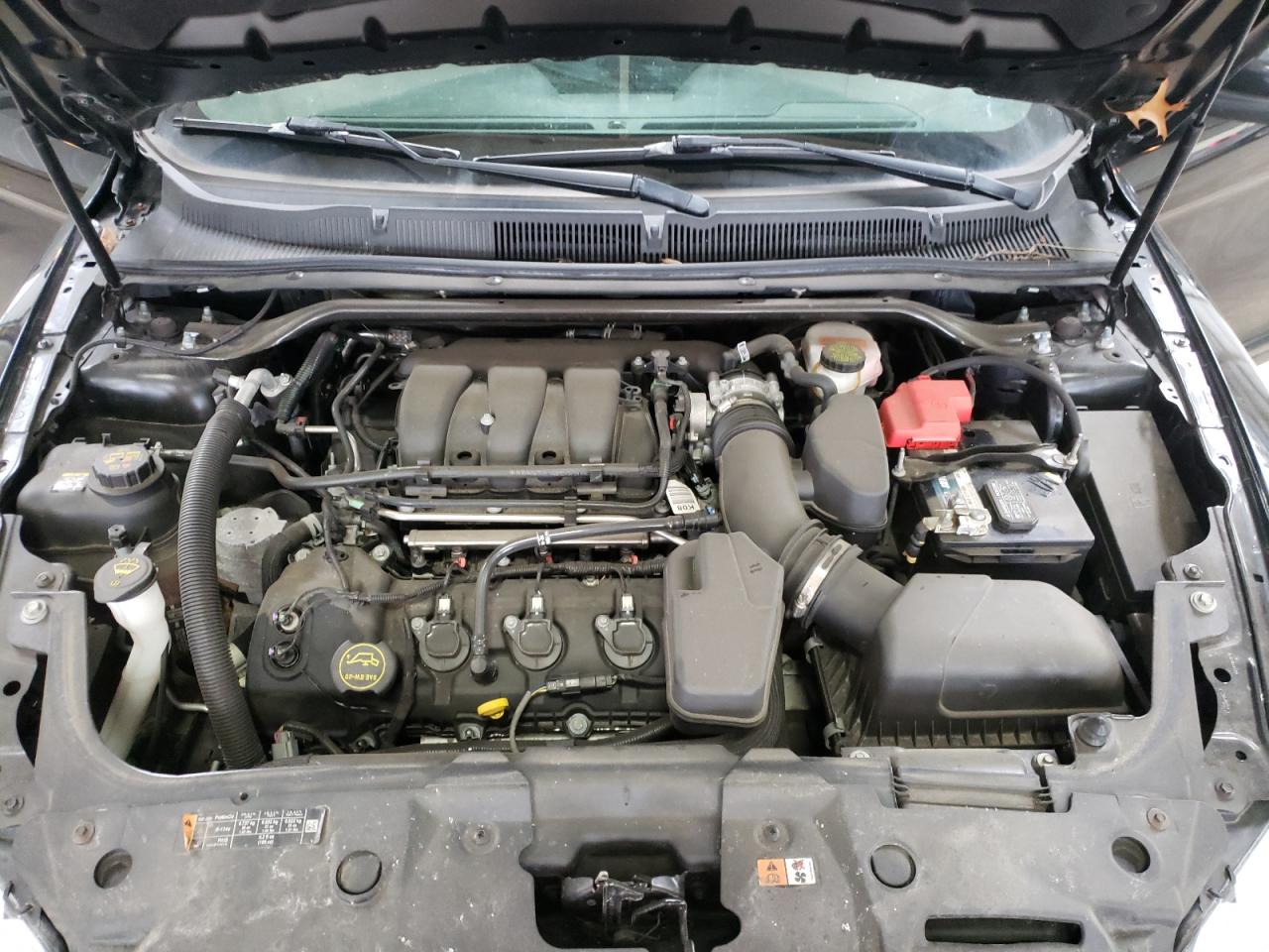 Photo 17 from auction – 2016 FORD TAURUS SEL with VIN 1FAHP2E81GG140848