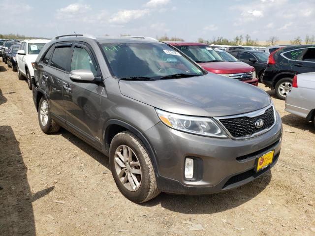 KIA SORENTO LX 2014 with VIN 5XYKTCA67EG450640 - Photo from auction