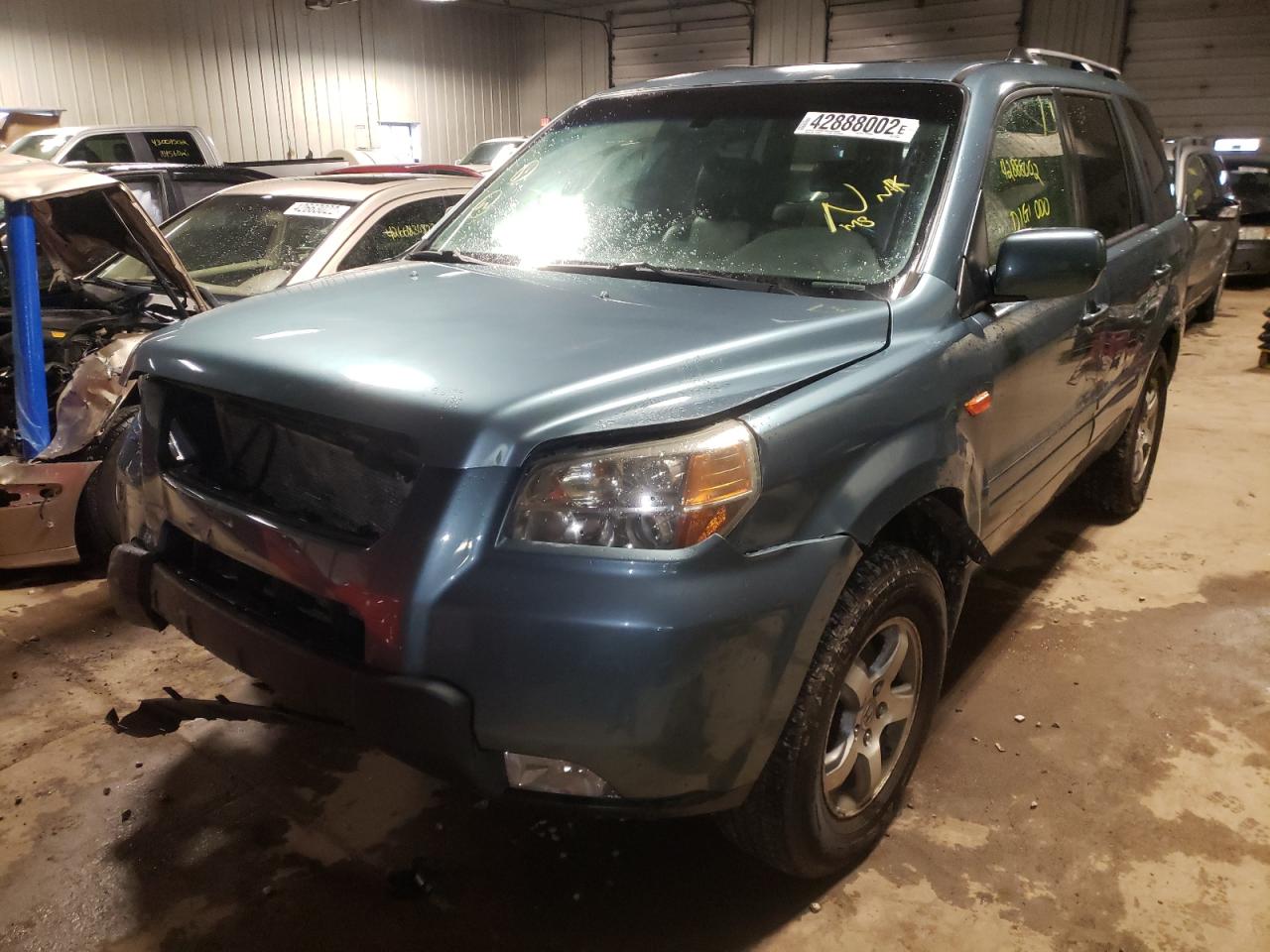 Photo 2 from auction – 2006 HONDA PILOT EX with VIN 2HKYF18616H500180