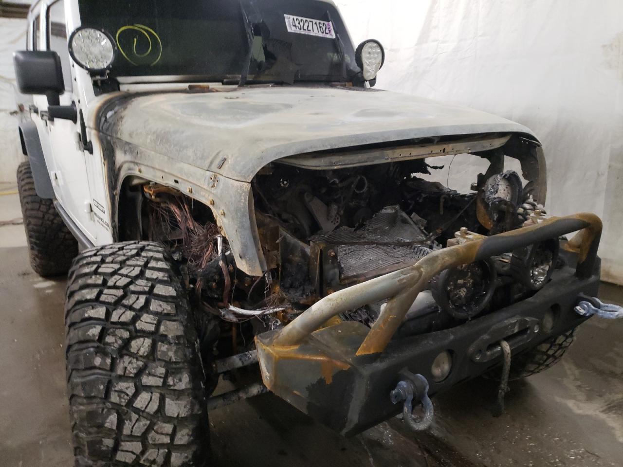 Photo 9 from auction – 2013 JEEP WRANGLER U with VIN 1C4BJWDG5DL627555