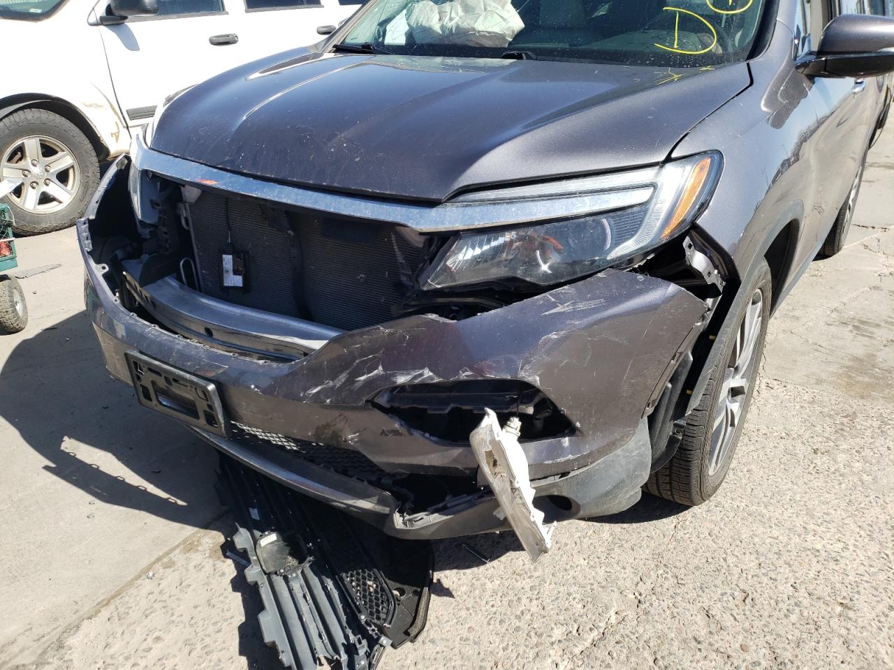 Photo 9 from auction – 2017 HONDA PILOT TOUR with VIN 5FNYF6H92HB012316