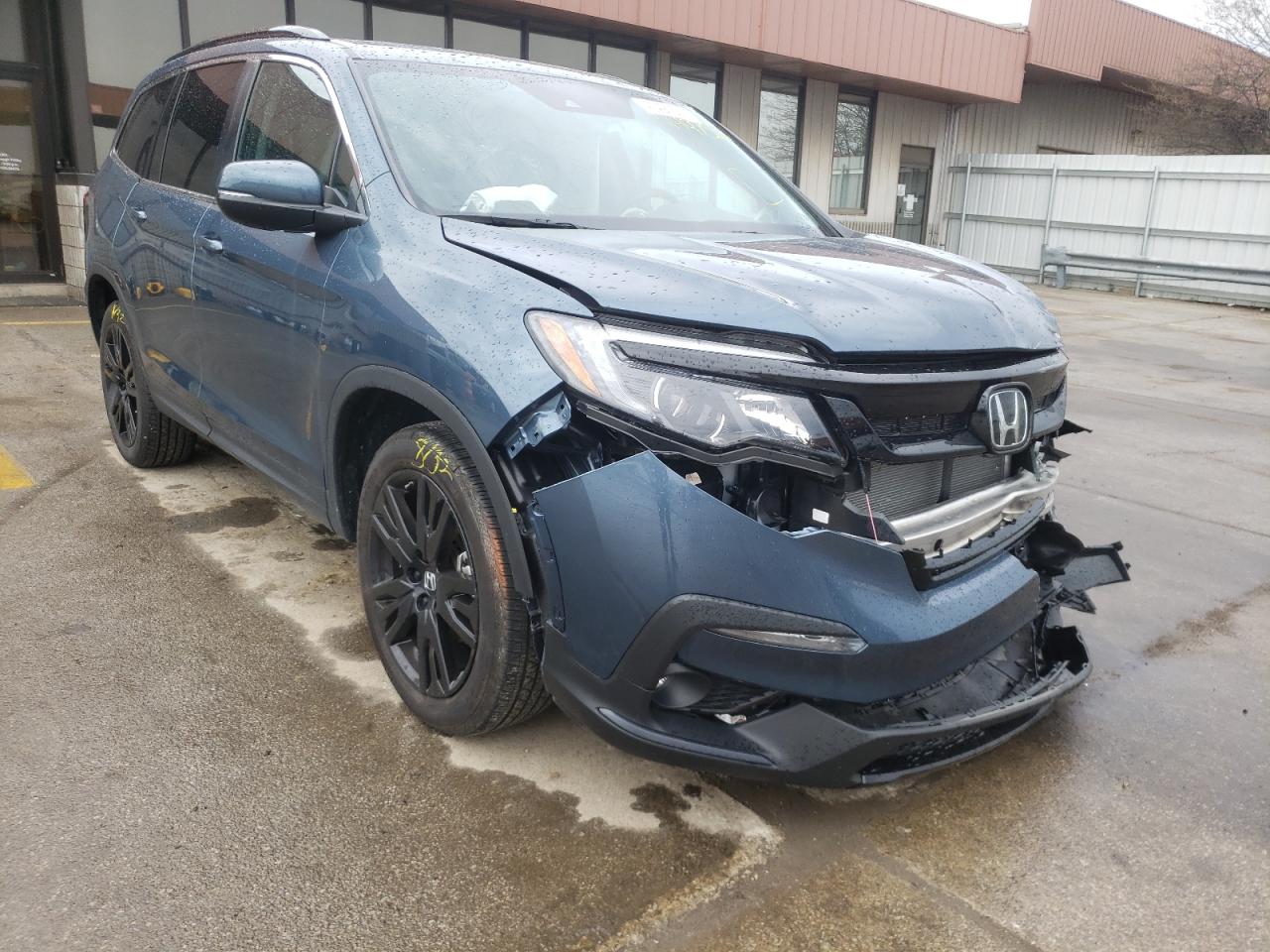 HONDA PILOT SE 2021 with VIN 5FNYF6H22MB059309 - Photo from auction