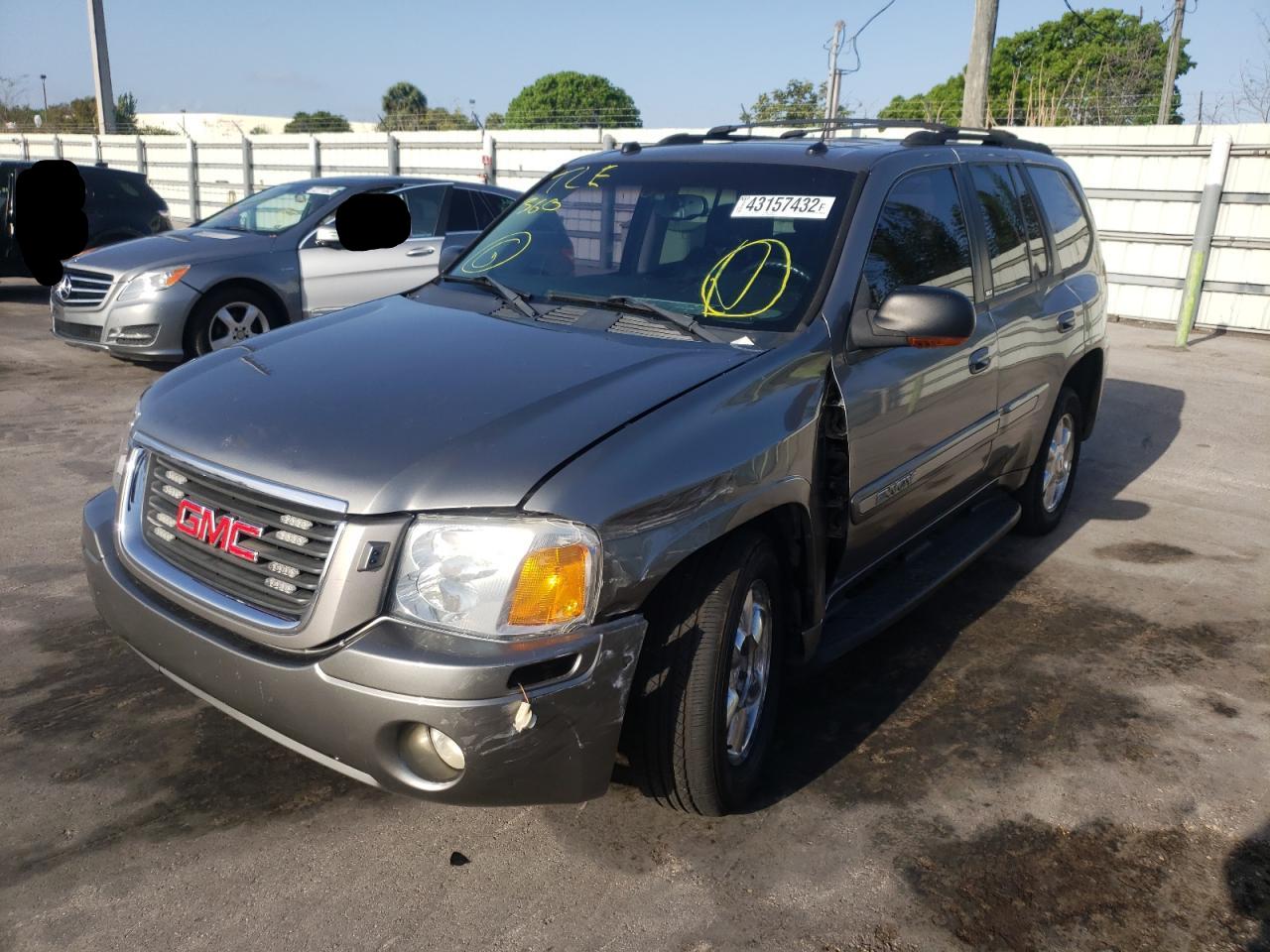 Photo 2 from auction – 2005 GMC ENVOY with VIN 1GKDS13S852354301