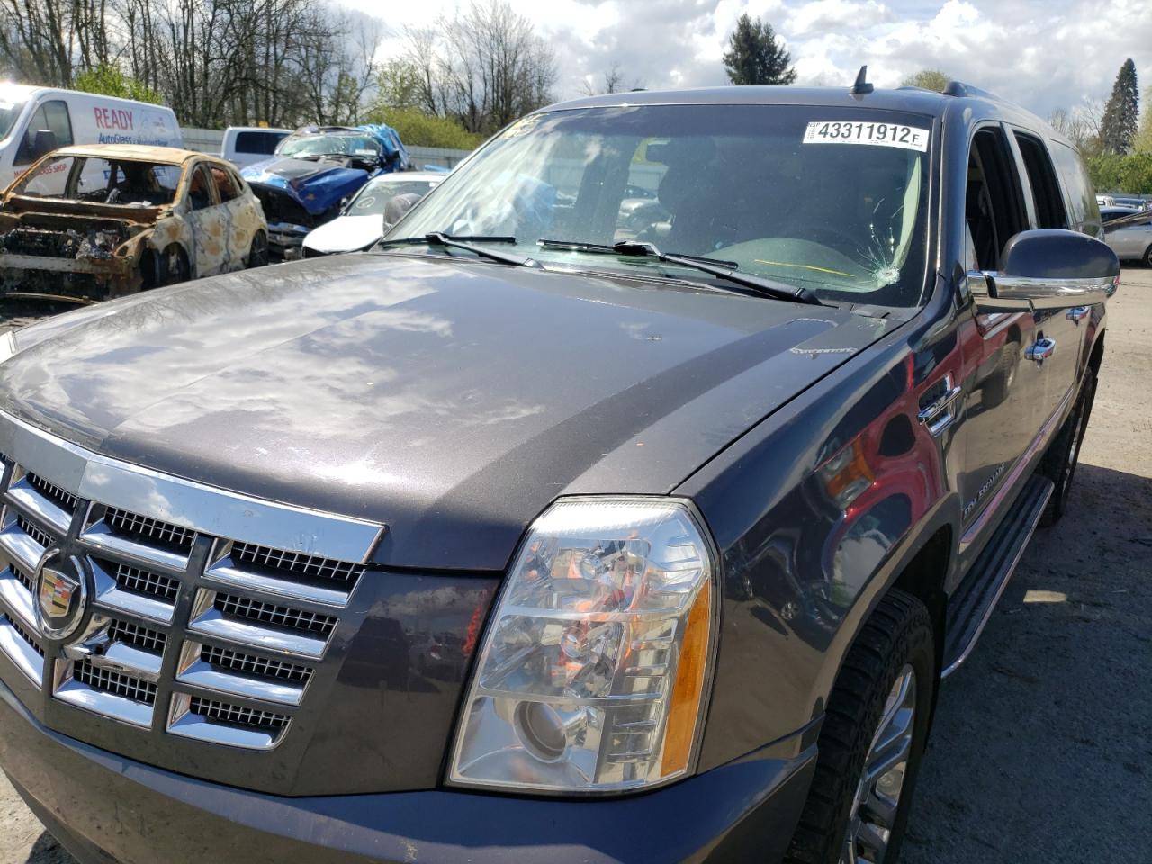 Photo 9 from auction – 2010 CADILLAC ESCALADE E with VIN 1GYUKHEF4AR283906