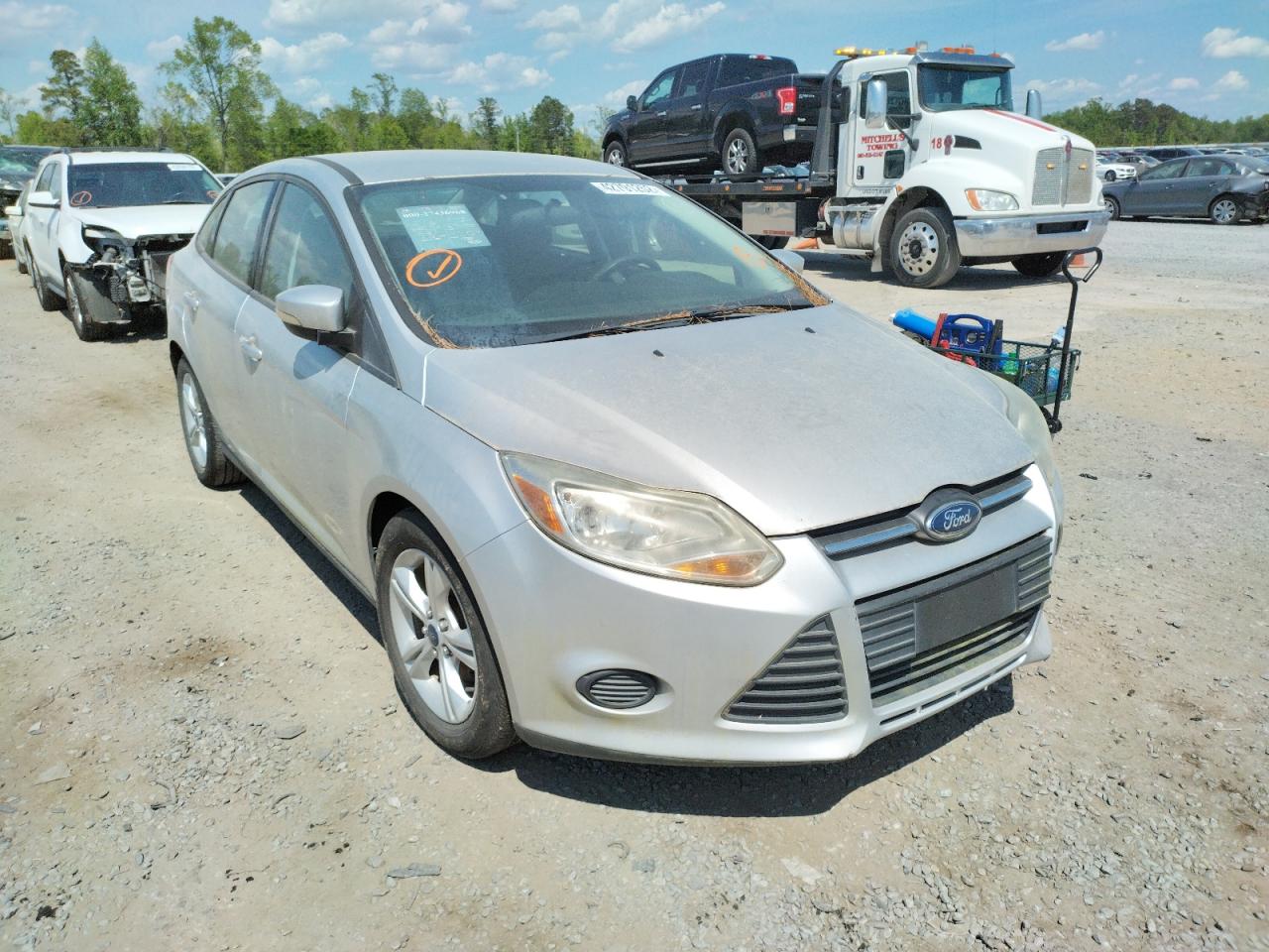 FORD FOCUS SE 2014 with VIN 1FADP3F23EL393527 - Photo from auction