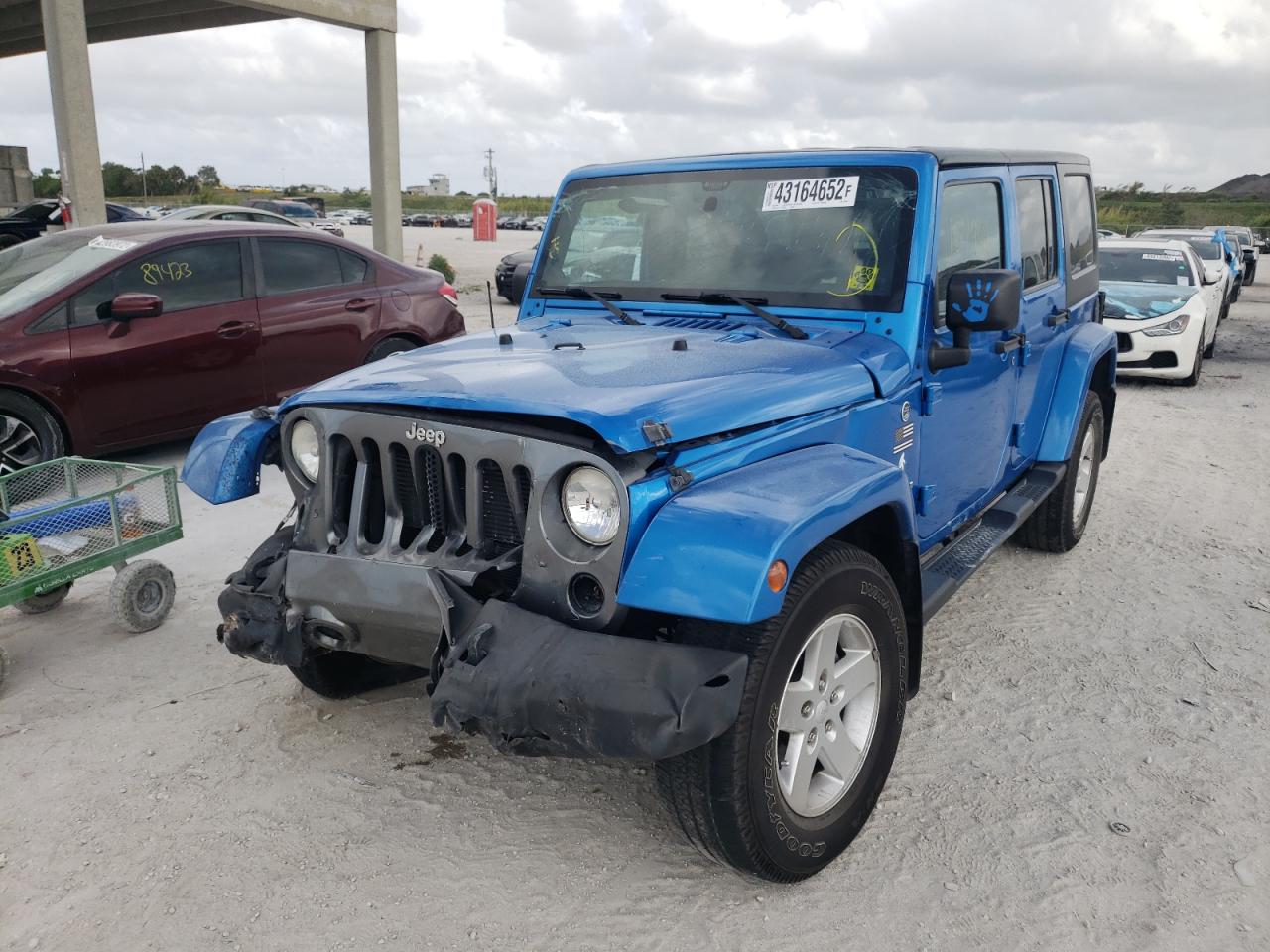 Photo 2 from auction – 2014 JEEP WRANGLER U with VIN 1C4BJWDG7EL222864