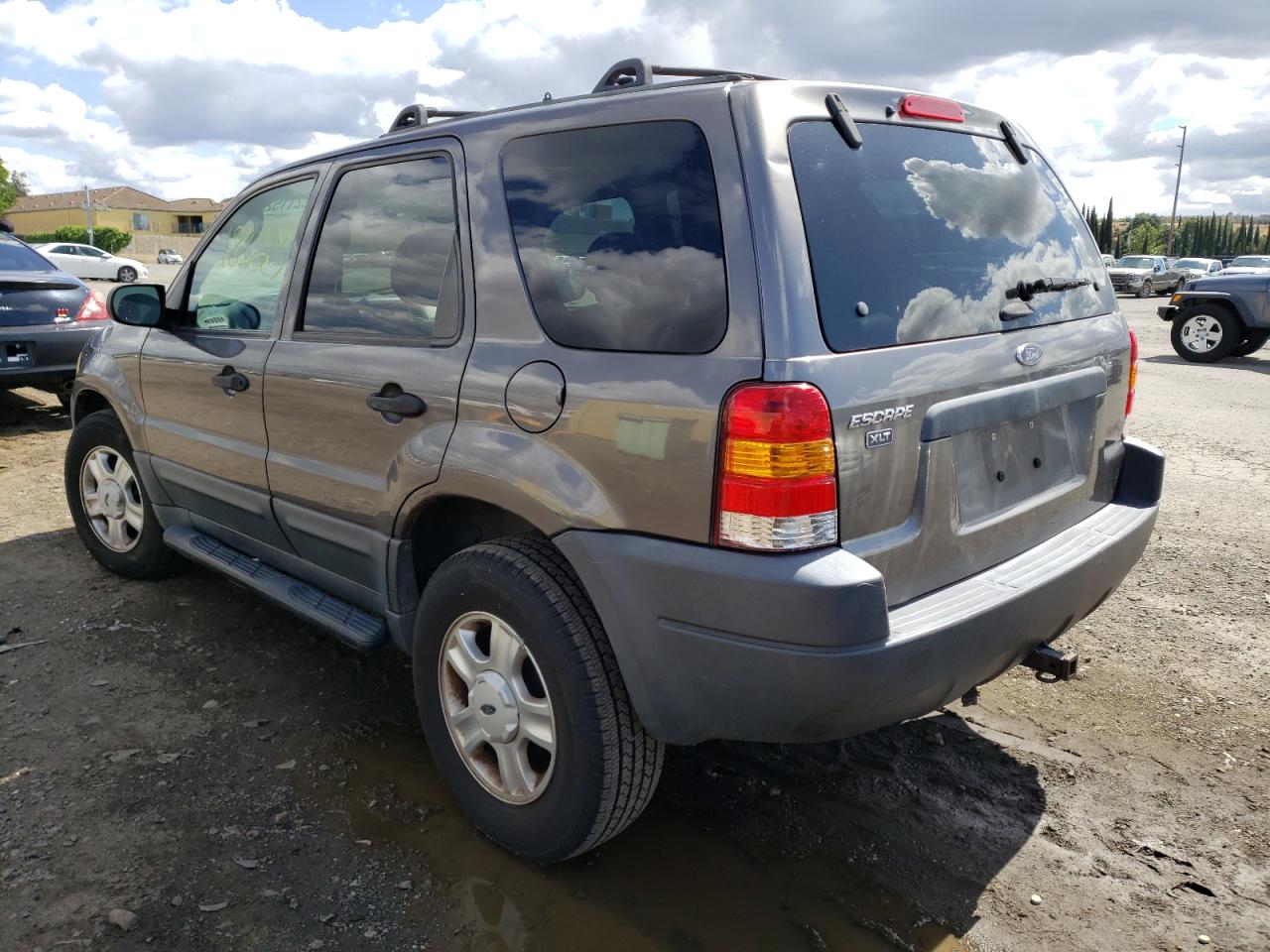 Photo 3 from auction – 2003 FORD ESCAPE XLT with VIN 1FMYU93183KB23369