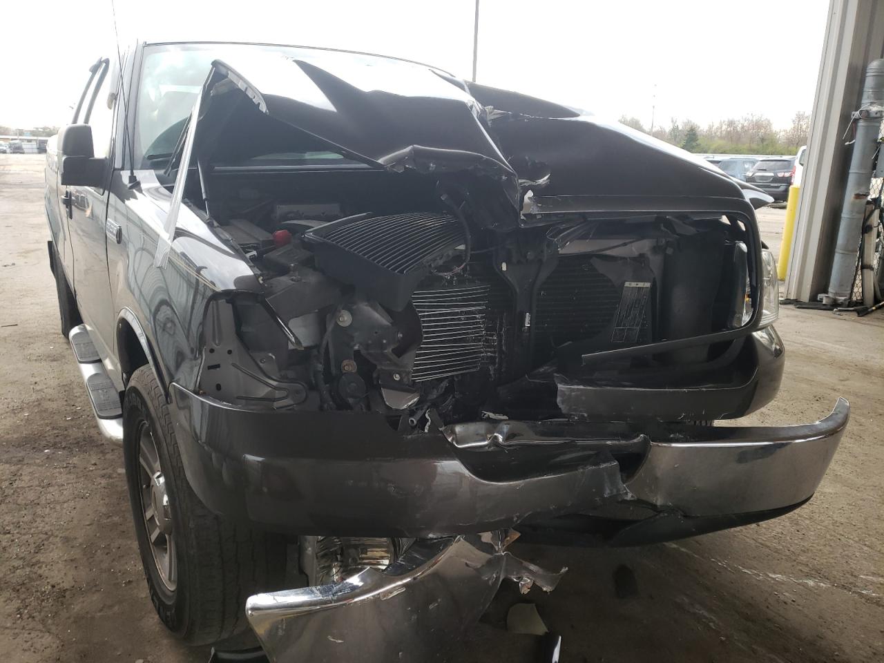 Photo 9 from auction – 2006 FORD F150 with VIN 1FTPX12506NA44813