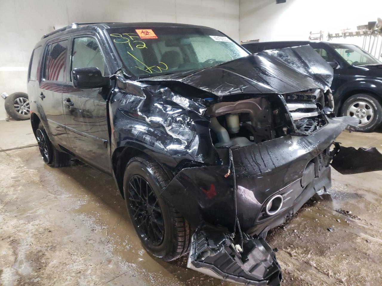 HONDA PILOT EXL 2012 with VIN 5FNYF4H68CB023372 - Photo from auction
