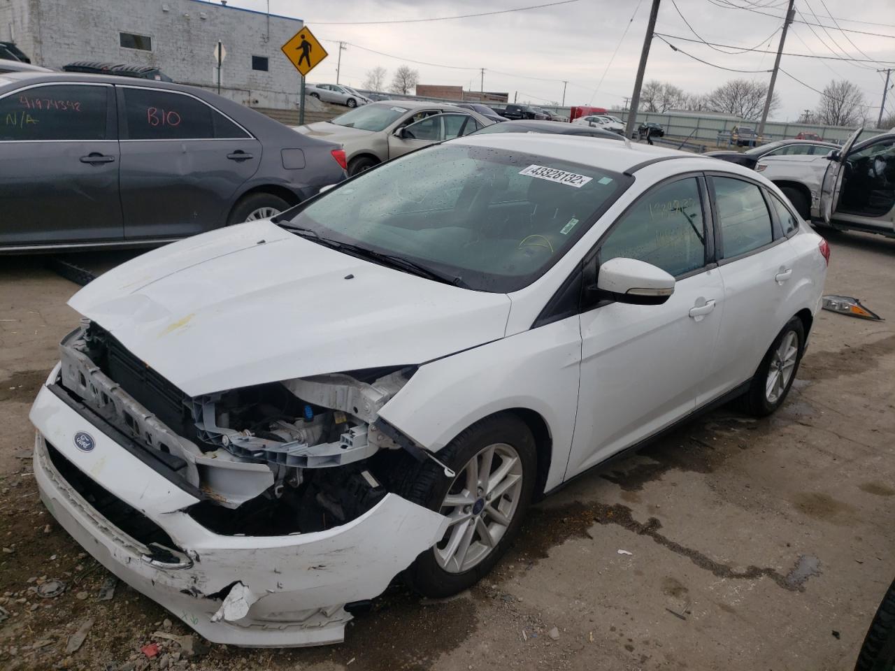 Photo 2 from auction – 2015 FORD FOCUS SE with VIN 1FADP3F23FL366667